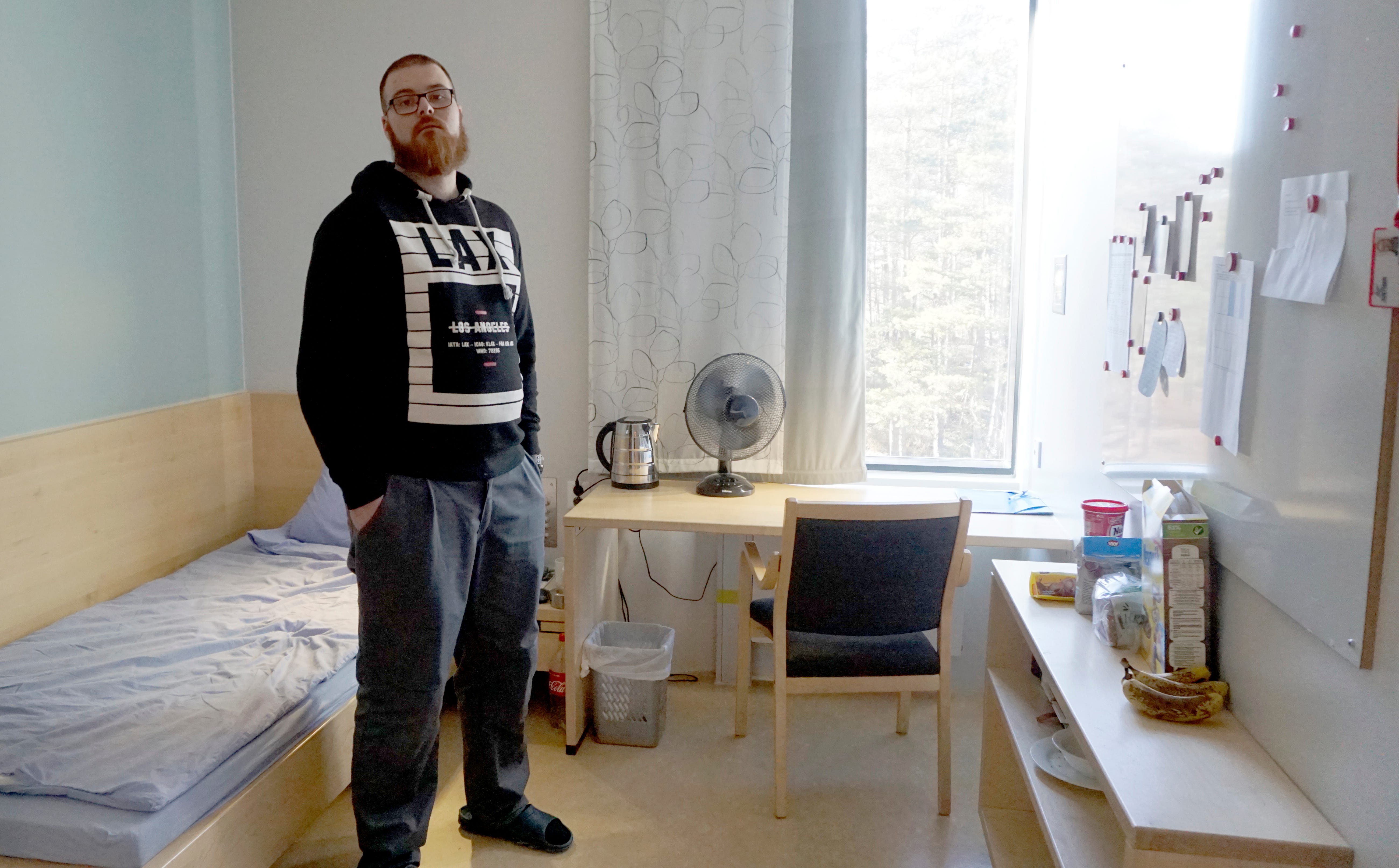 Andre, who asked that his last name be withheld, stands in his room at Halden Prison in Norway, where there are no bars, barbed wire or armed guards. He's there for the kidnap and torture of a man in Norway's drug underworld, and lives in a substance use treatment unit at Halden.