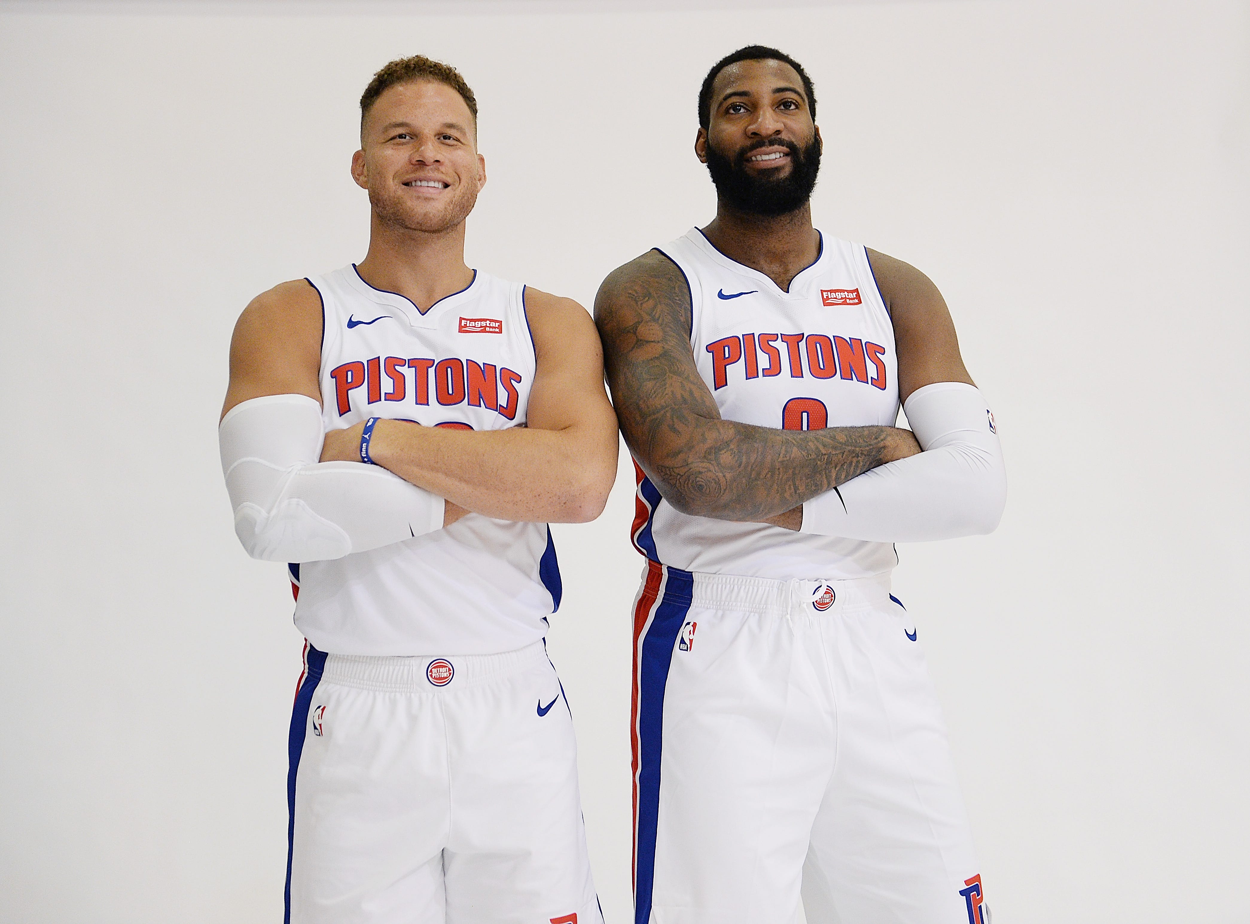 Blake Griffin and Andre Drummond pose.