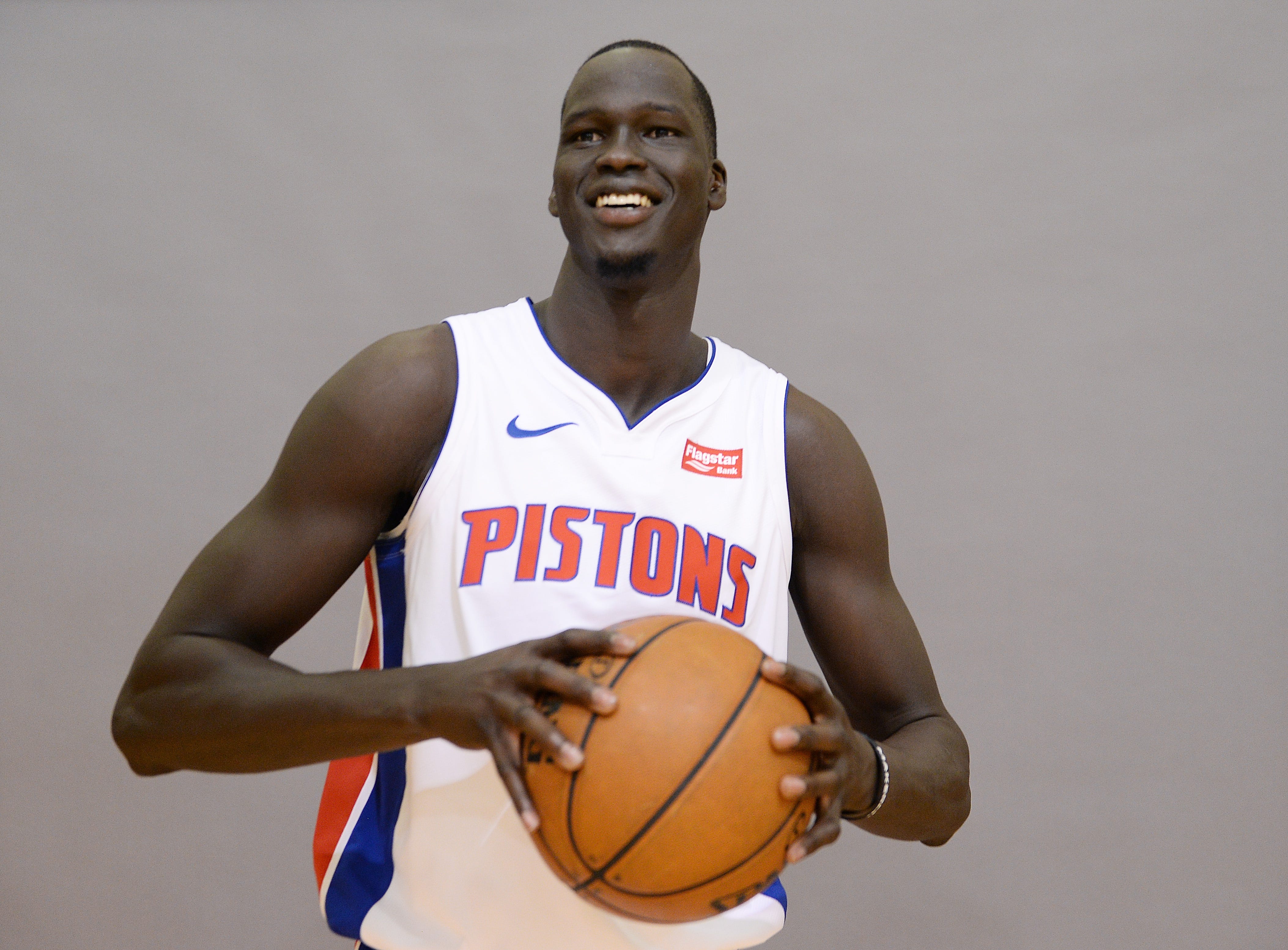 Thon Maker smiles for photographers during his shoot.
