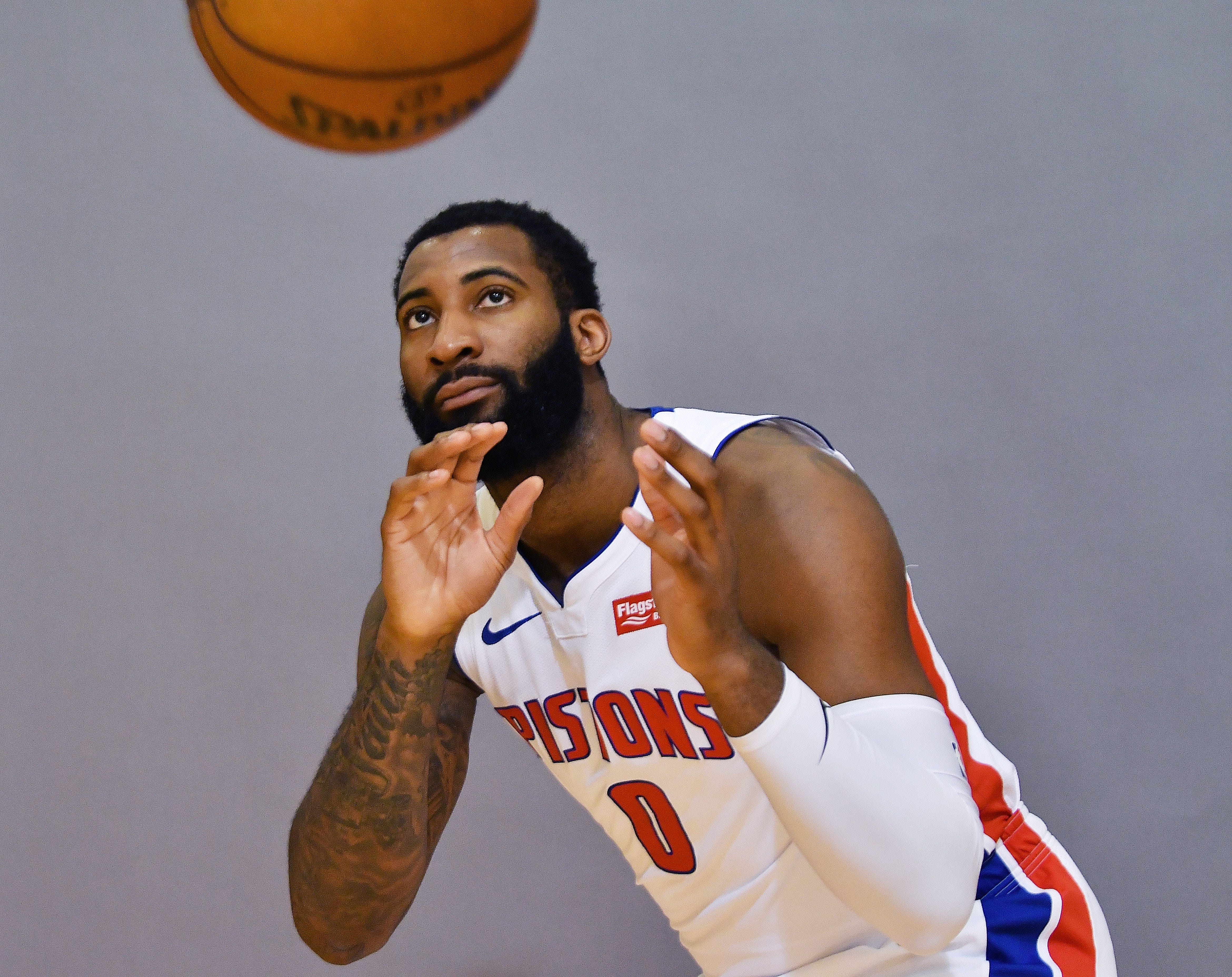 Andre Drummond prepares to catch a pass during his photo shoot.