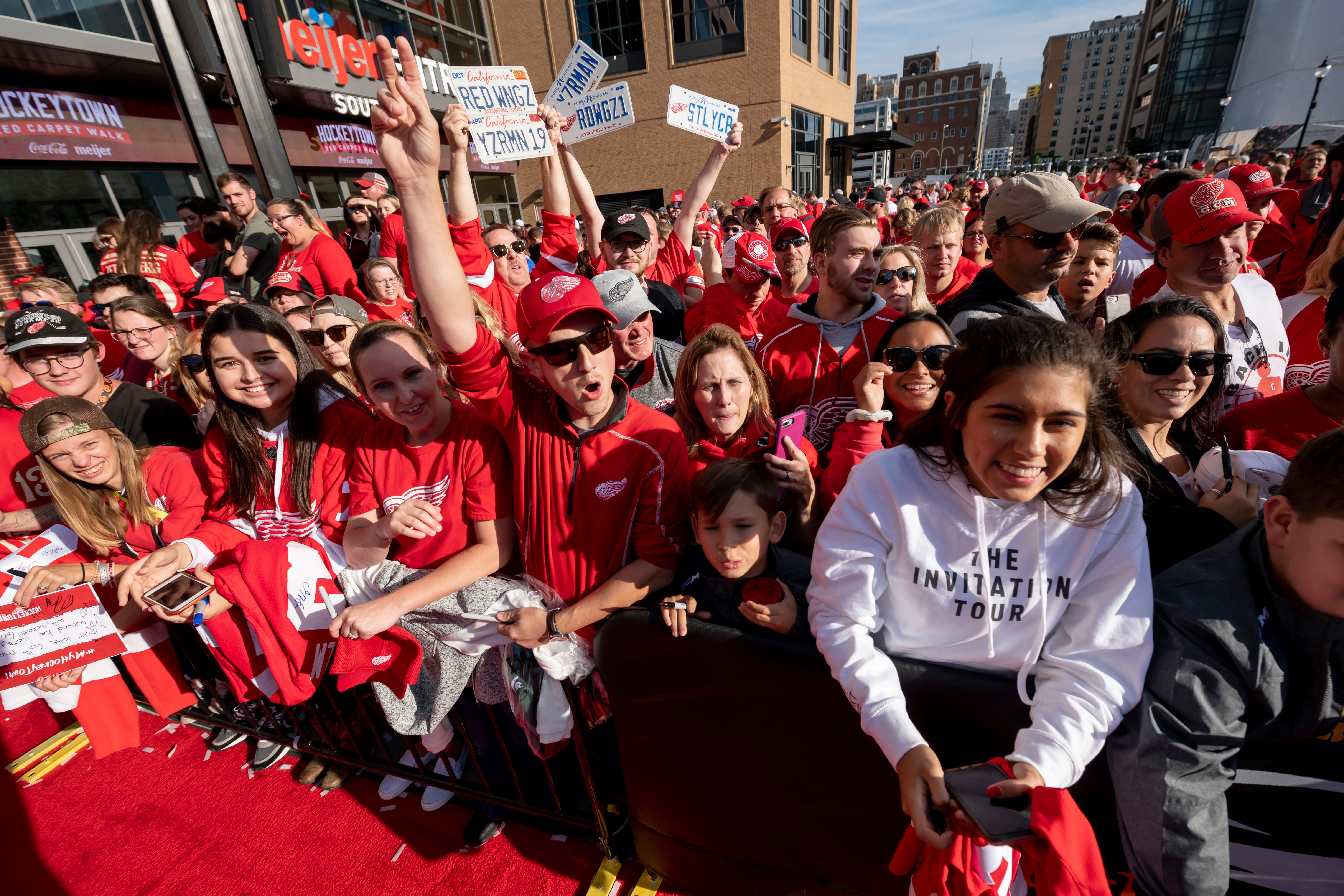 Fans wait for autographs and photographs as the Red Wings participate in a red carpet ceremony before the team's home opener against the Dallas Stars.