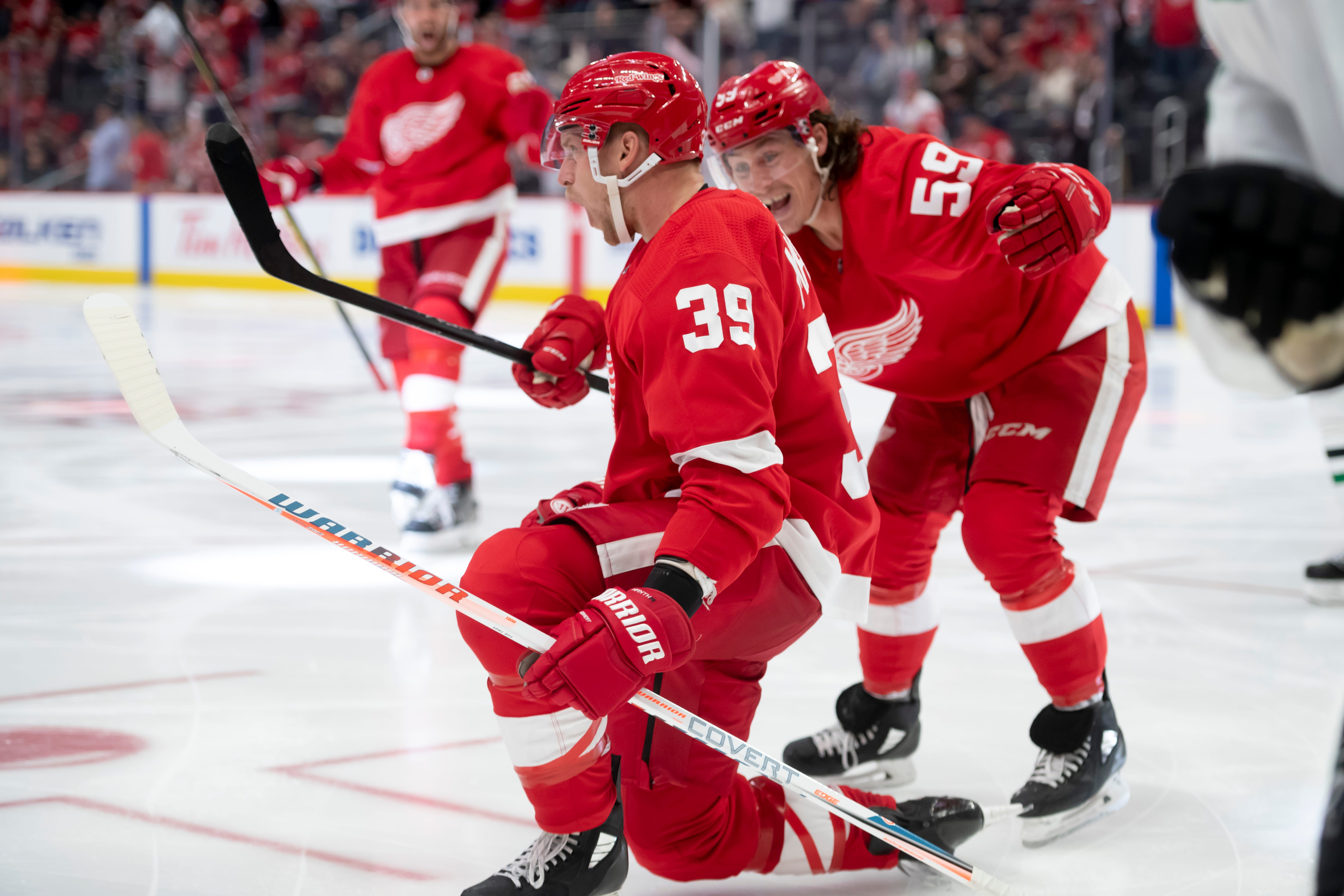 Detroit right wing Anthony Mantha (39) celebrates with Detroit left wing Tyler Bertuzzi after scoring his third goal of the game in the third period.