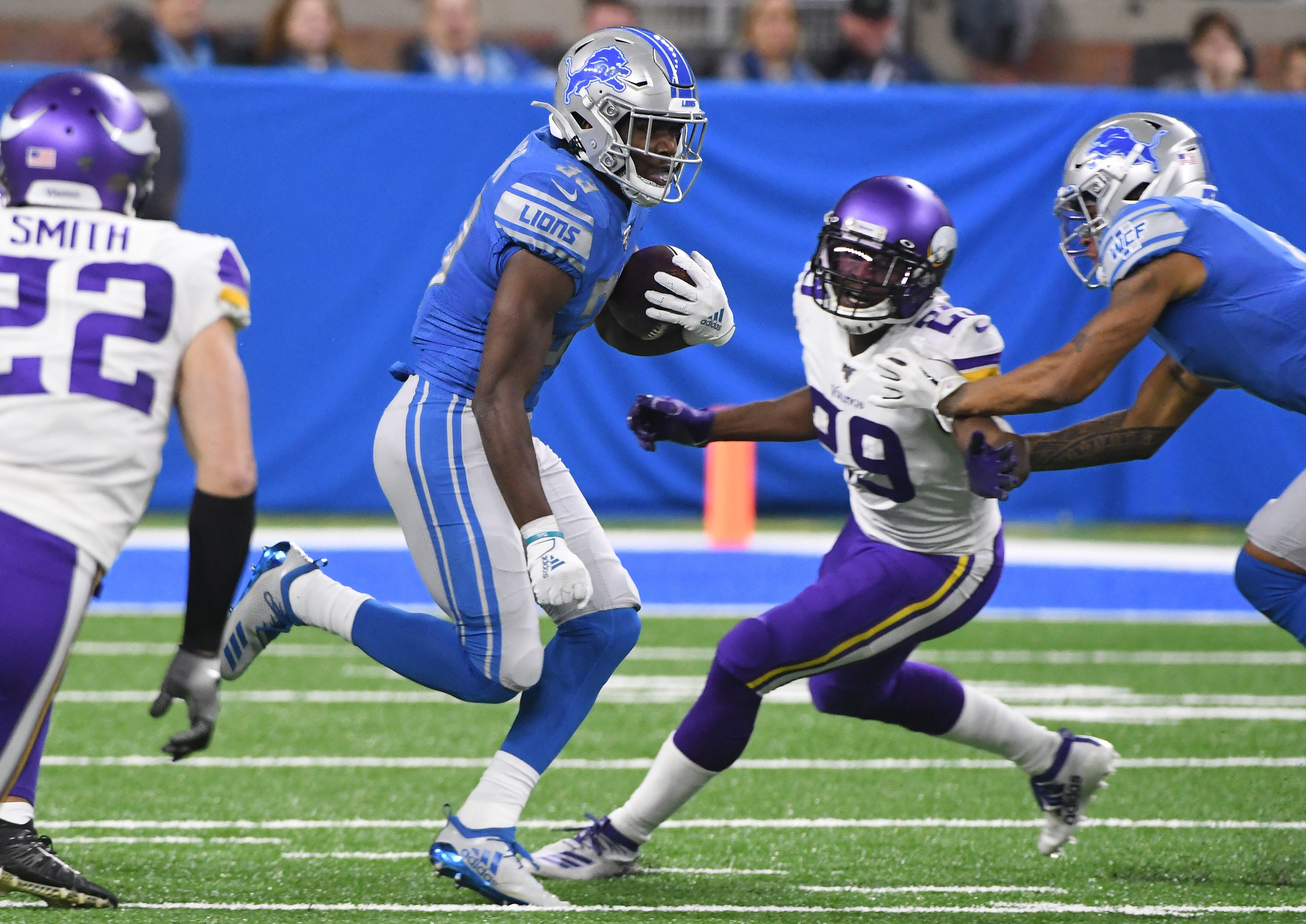 Lions running back Kerryon Johnson heads upfield in the first quarter. Johnson would later get hurt with running back Ty Johnson picking up the slack.