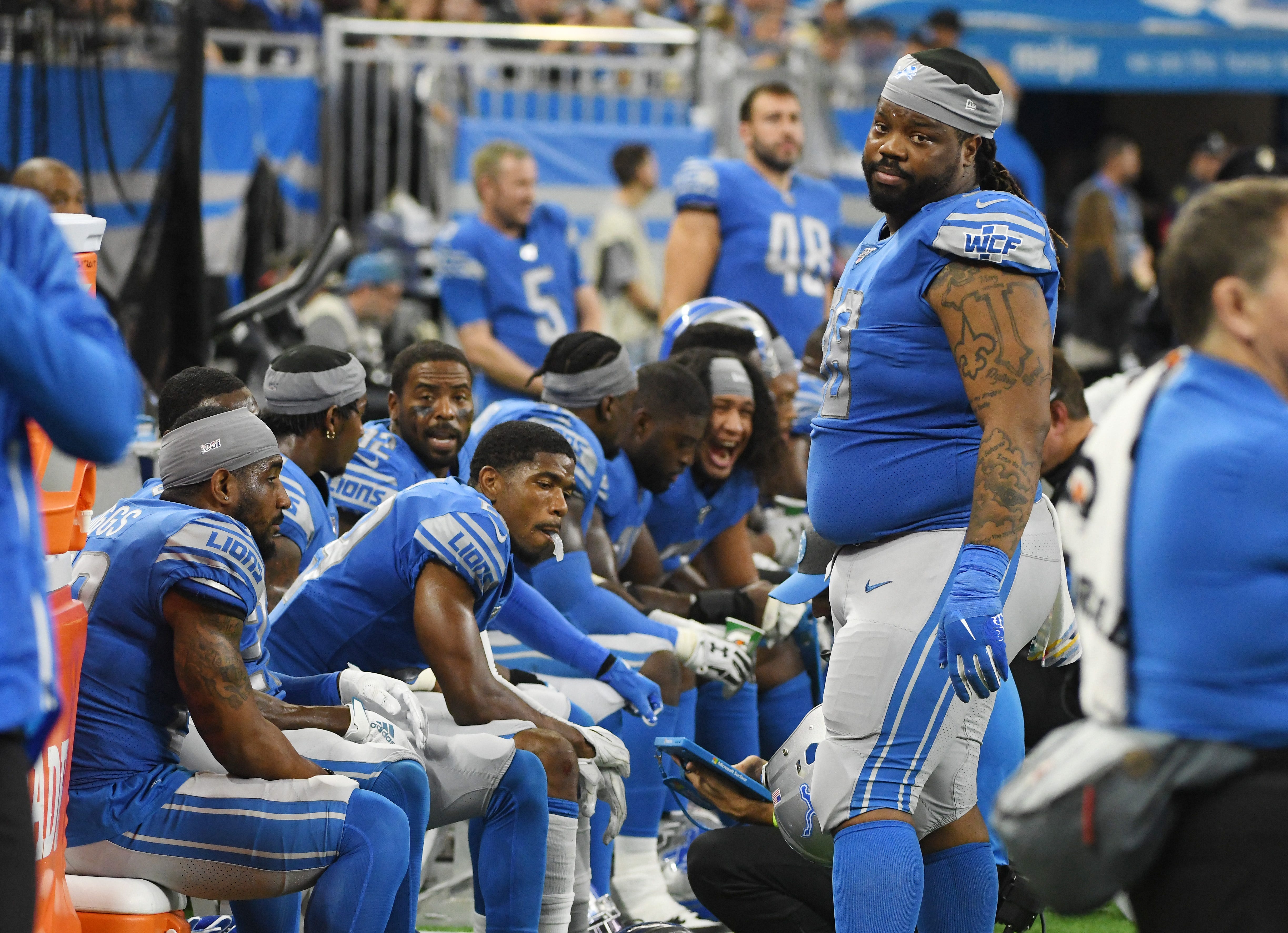Lions ' Damon Harrison and the defense on the bench late in the fourth quarter of the 42-30 loss the Vikings.