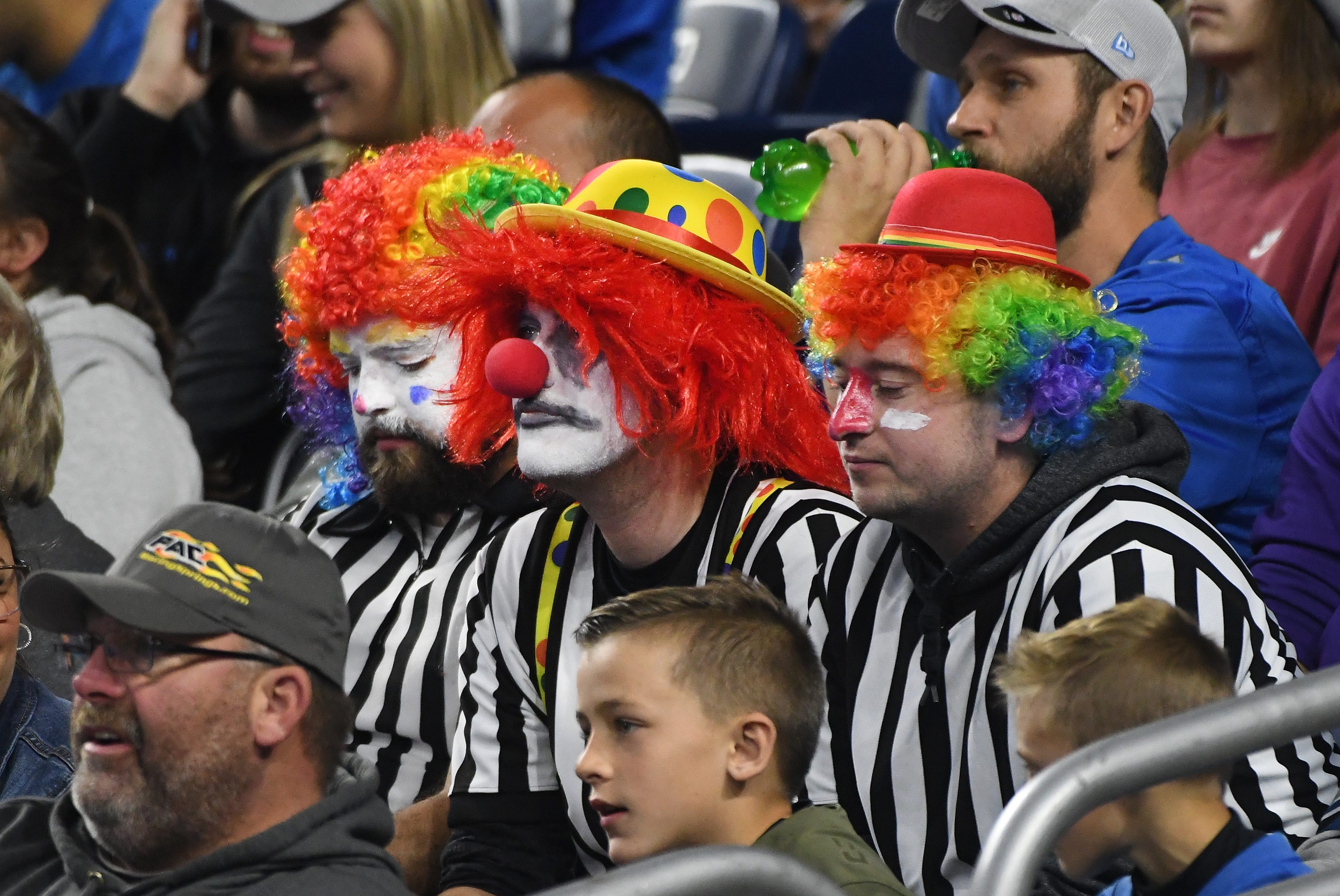 No humor in this crowd, as Lions fans dressed in referee clown outfits sit quietly during the 42-30 loss to the Minnesota Vikings at Ford Field in Detroit on Sunday, Oct. 20, 2019