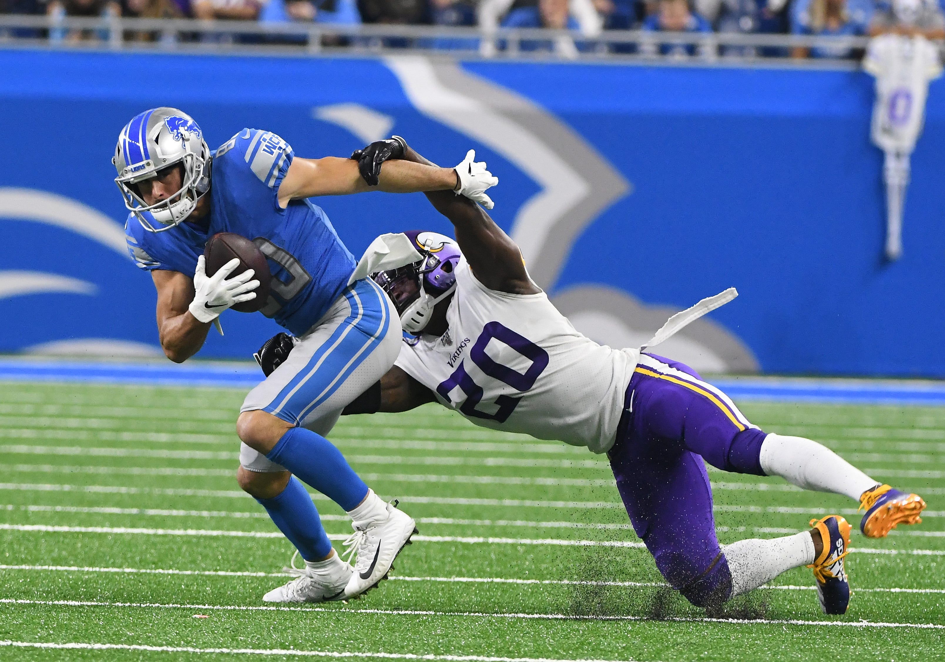 Lions ' Danny Amendola breaks away from Vikings ' Mackensie Alexander for a first-down reception in the second quarter.