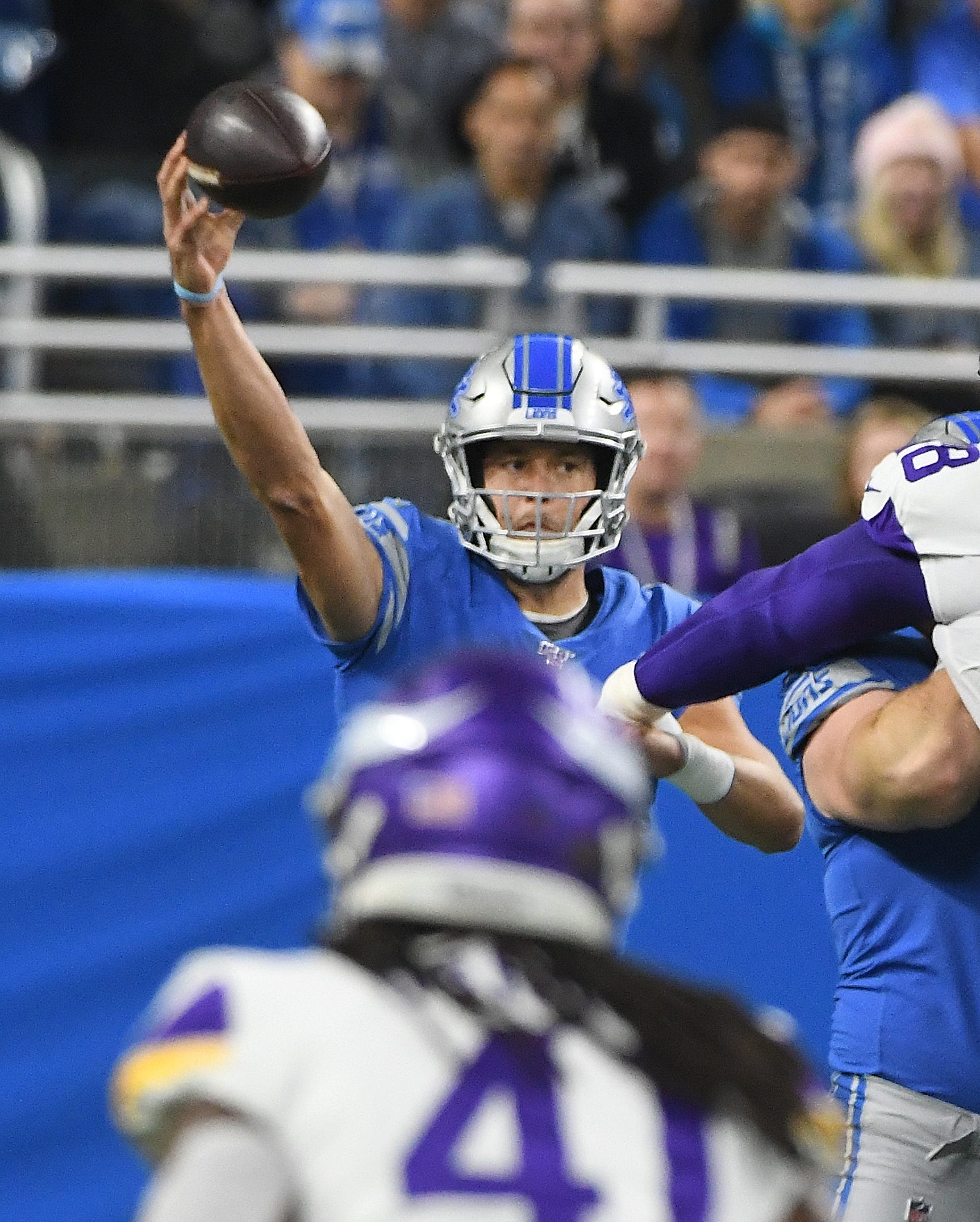 Lions quarterback Matthew Stafford throws in the first quarter.