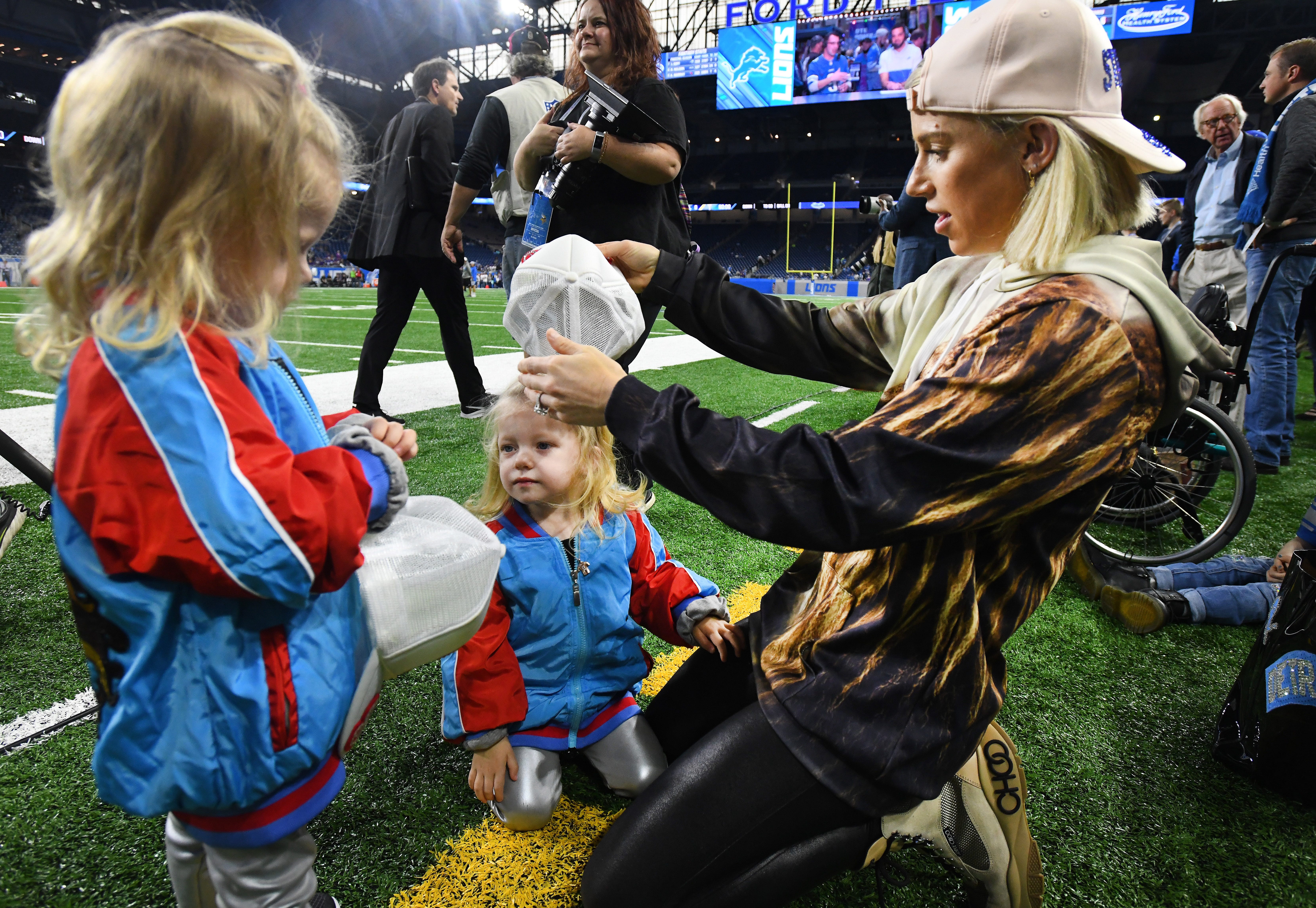 Twins Sawyer and Chandler hang out with mom, Kelly Stafford, before the Lions take on the Vikings at Ford Field.