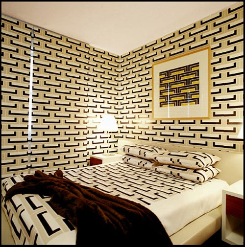 This is the room that launched Natale with spreads in Belle (an Australian magazine) and Wallpaper magazine. He designed it for his oldest sister, and it celebrates his love for a fellow Australian designer, Florence Broadhurst. He tweaked the pattern and had it custom-colored, repeated it in the bedding, window shade (which seamlessly blends into the wall) and the framed art.