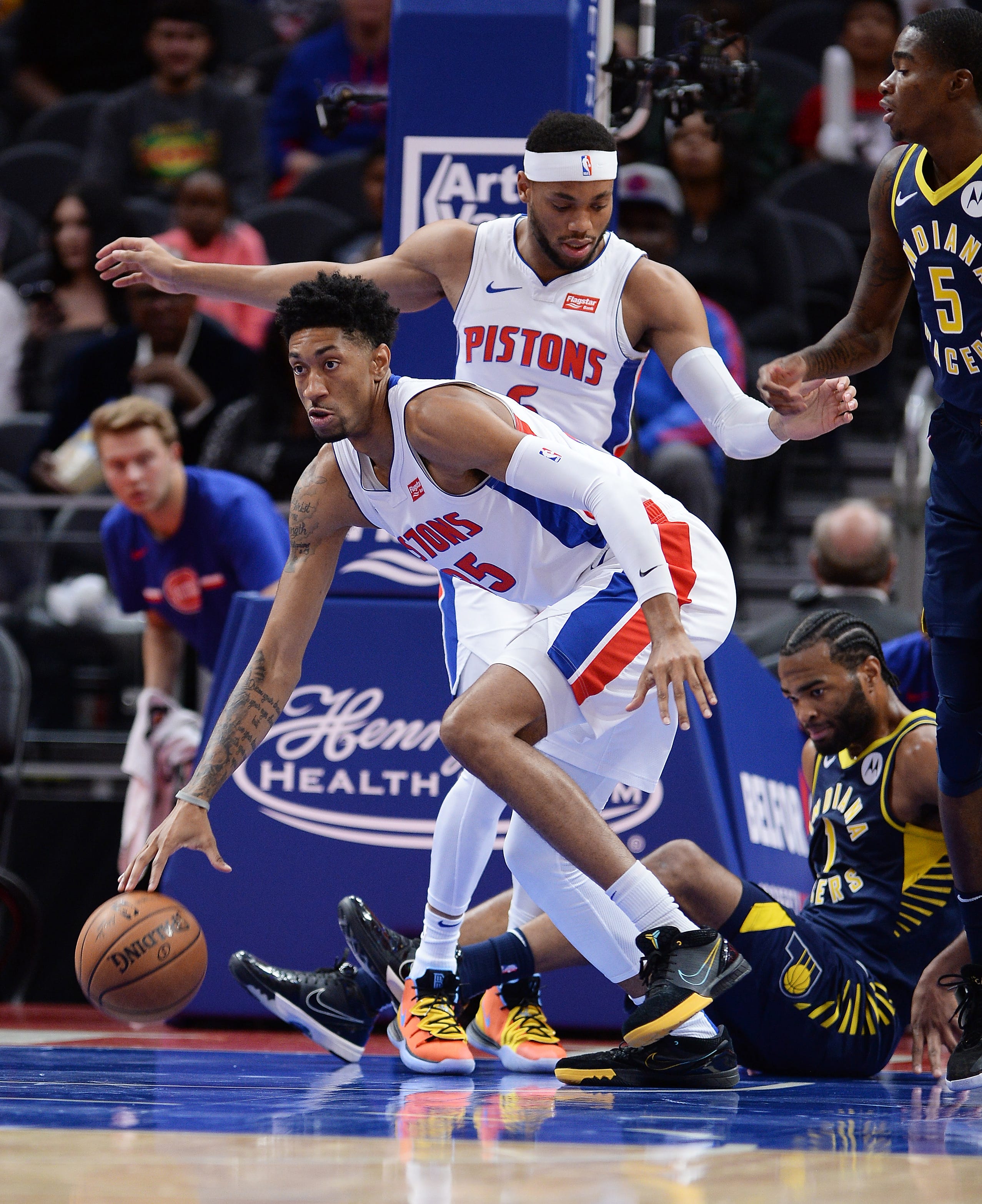 Pistons' Christian Wood grabs a rebound and leads the fast break during action in the first quarter.