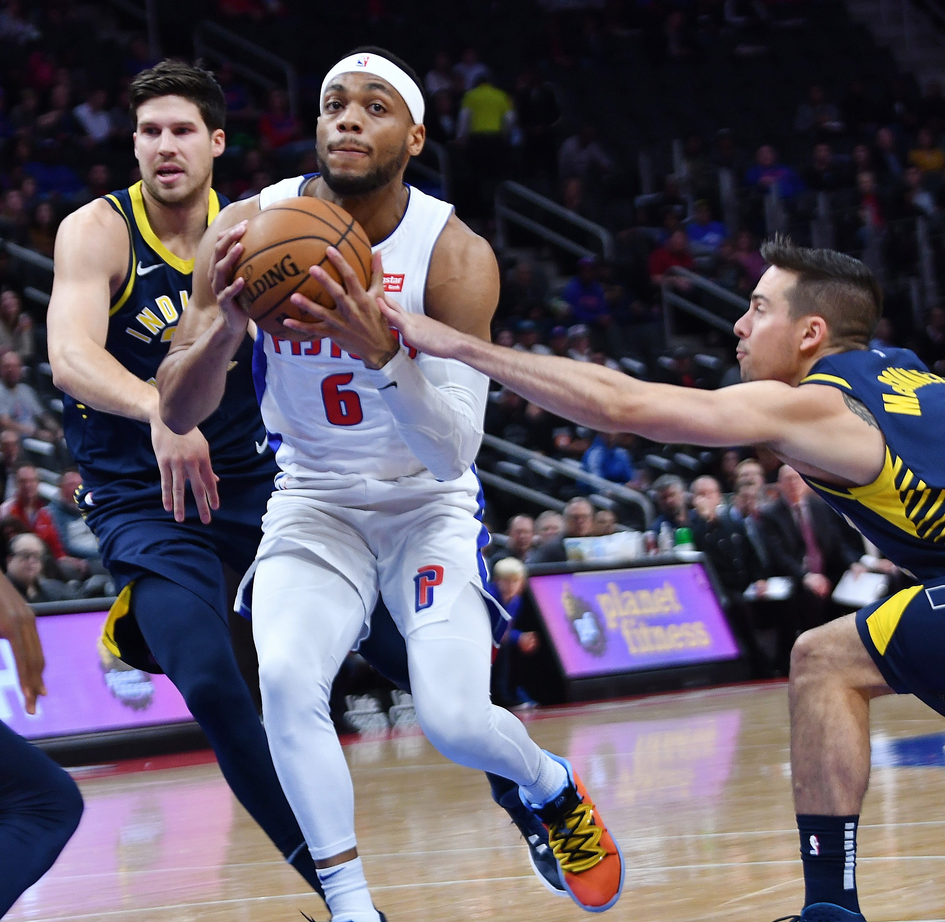 Pistons' Bruce Brown drives past Pacers' T.J. McConnell in the second quarter.