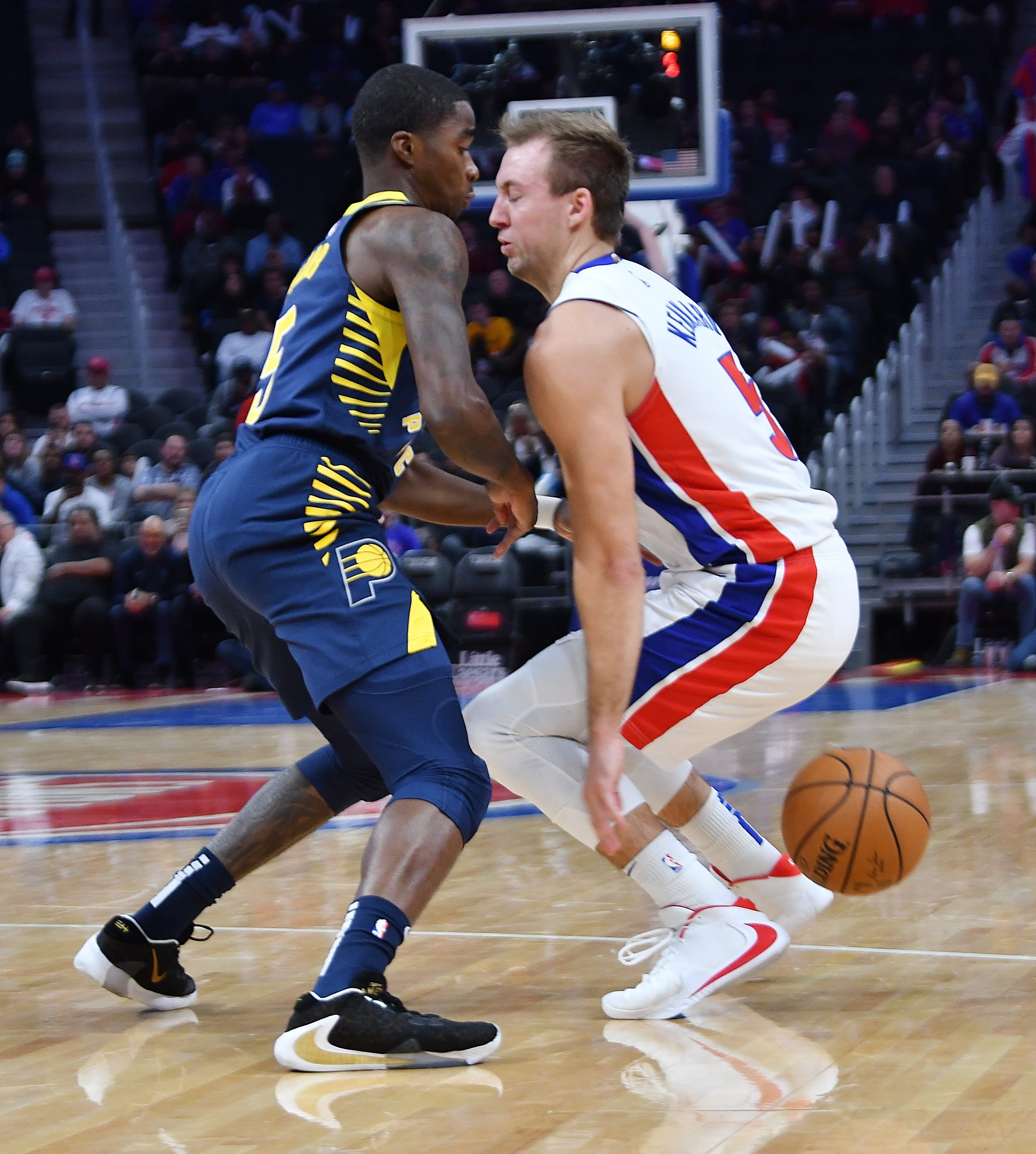 Pistons' Luke Kennard loses the ball for a turnover in the first quarter as Pacers' Edmond Sumner defends on the play. The Detroit Pistons host the Indiana Pacers at Little Caesars Arena, Monday night, October 28, 2019. The Pistons win, 96-94.