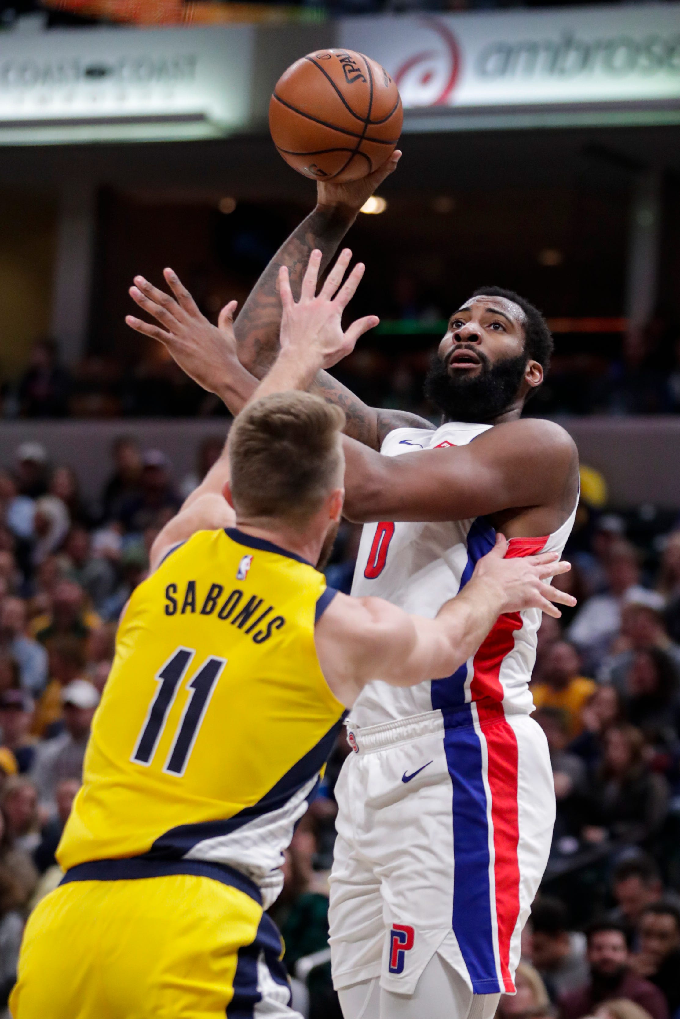 Detroit Pistons center Andre Drummond (0) shoots over Indiana Pacers forward Domantas Sabonis (11) during the first half.