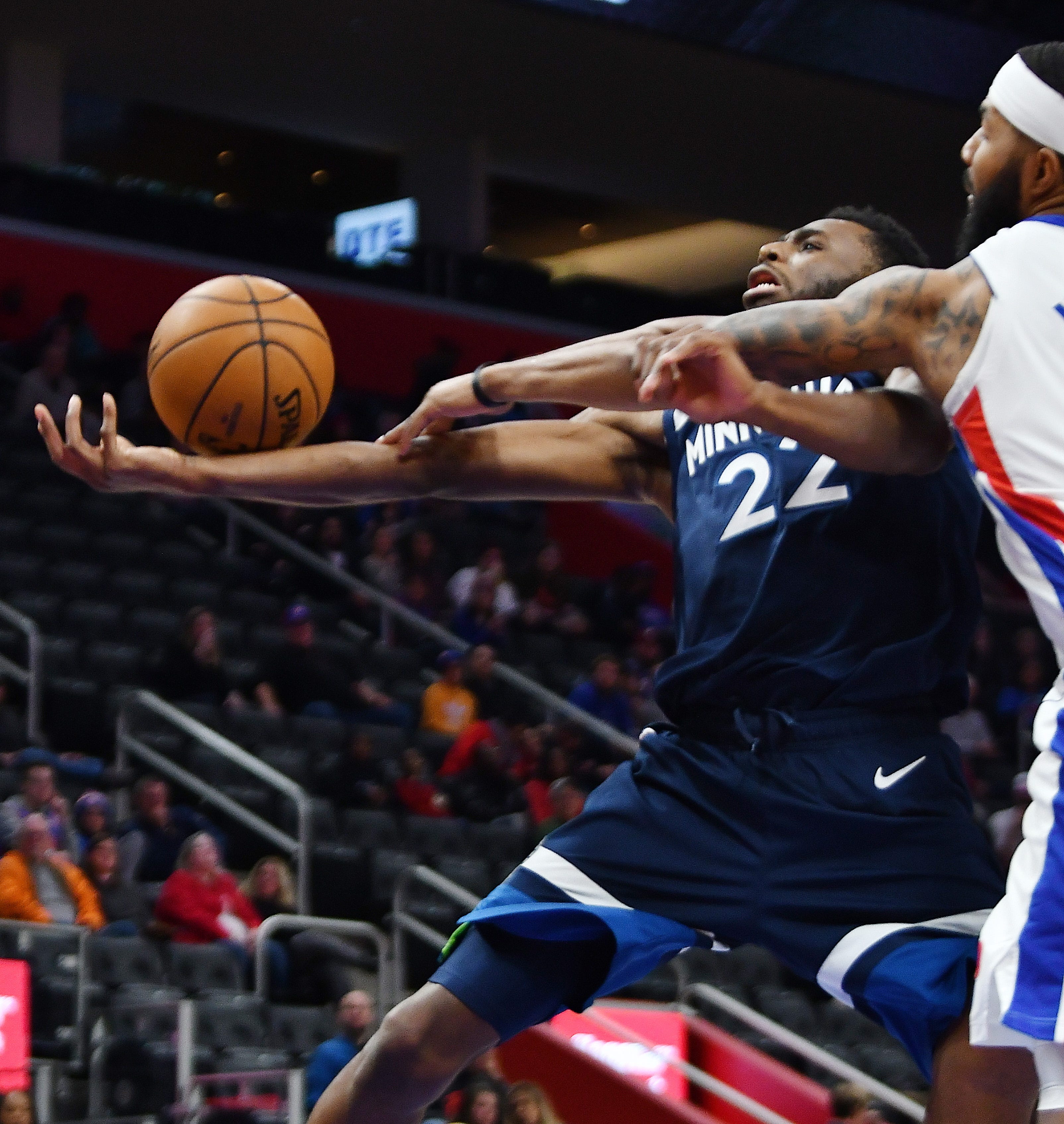 Timberwolves' Andrew Wiggins is fouled by Pistons' Markieff Morris in the fourth quarter.