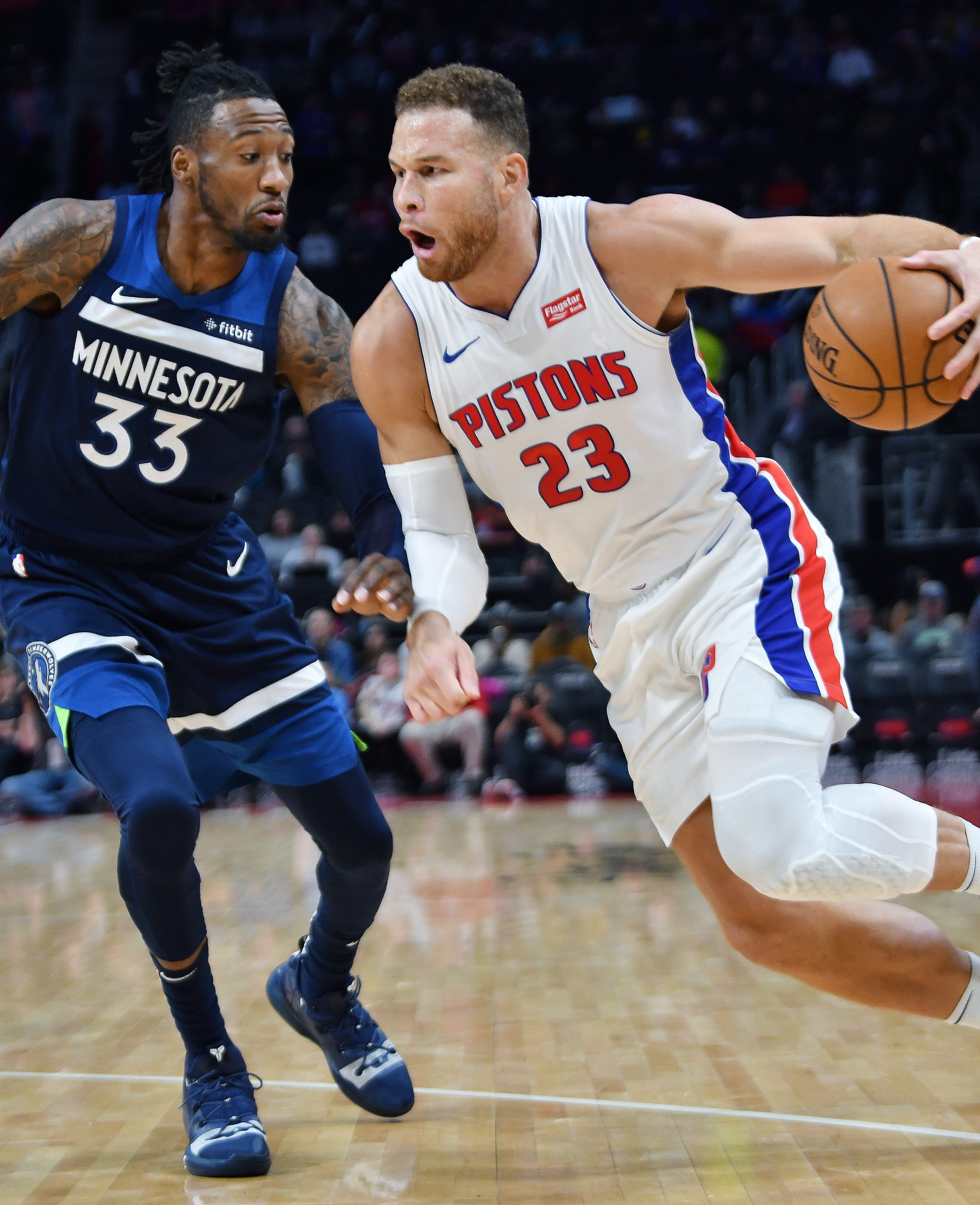 Pistons' Blake Griffin drives around Timberwolves' Robert Covington in the second quarter.