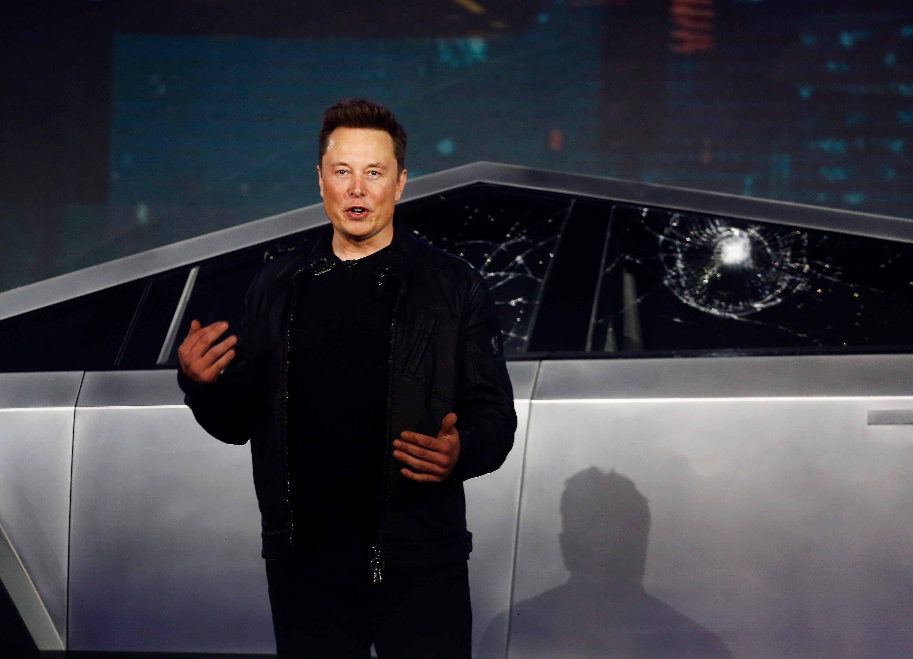 Tesla CEO Elon Musk introduces the Cybertruck at Tesla's design studio Thursday.