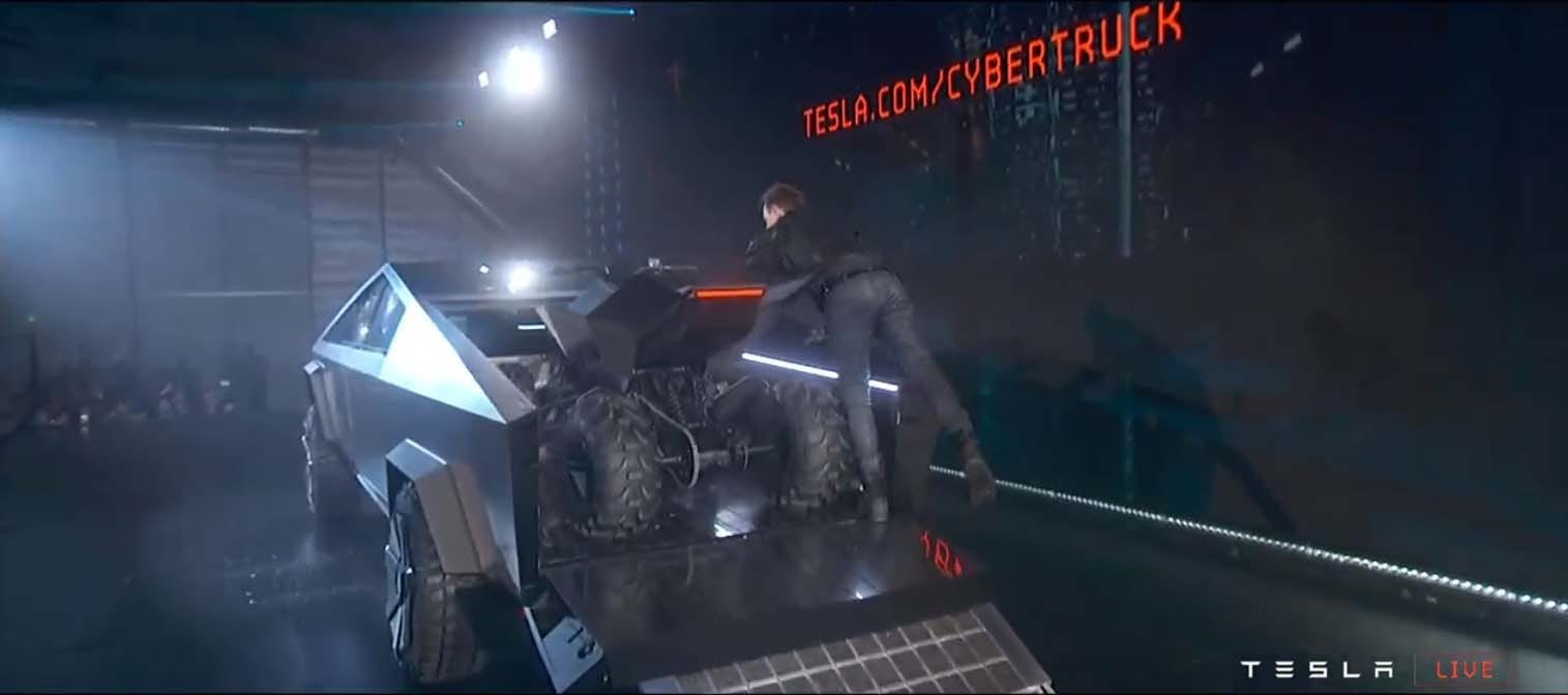 Tesla Cybertruck reveal: The bed becomes a ramp to allow an ATV to be rolled aboard.
