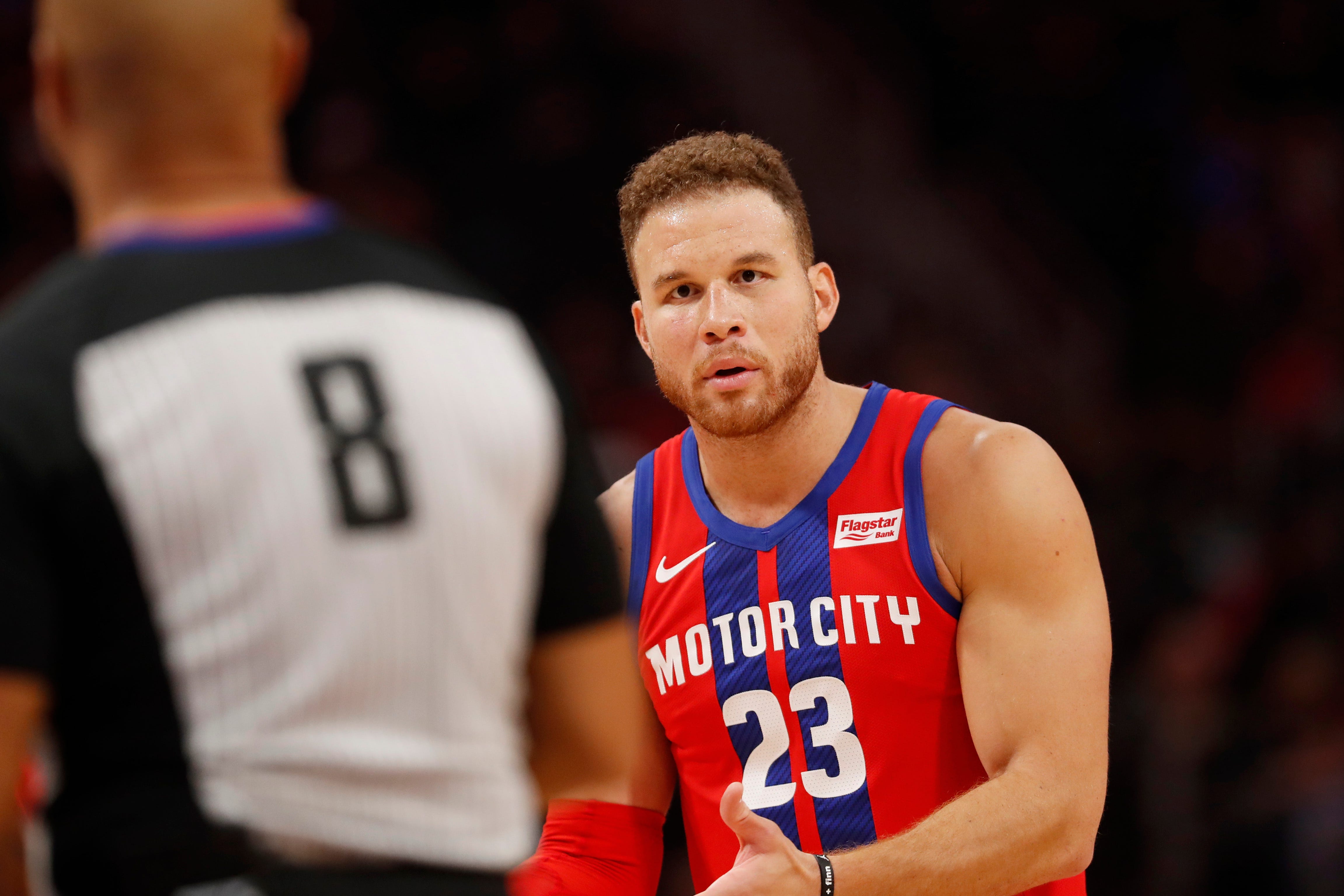 Pistons forward Blake Griffin talks with referee Marc Davis during the second half.