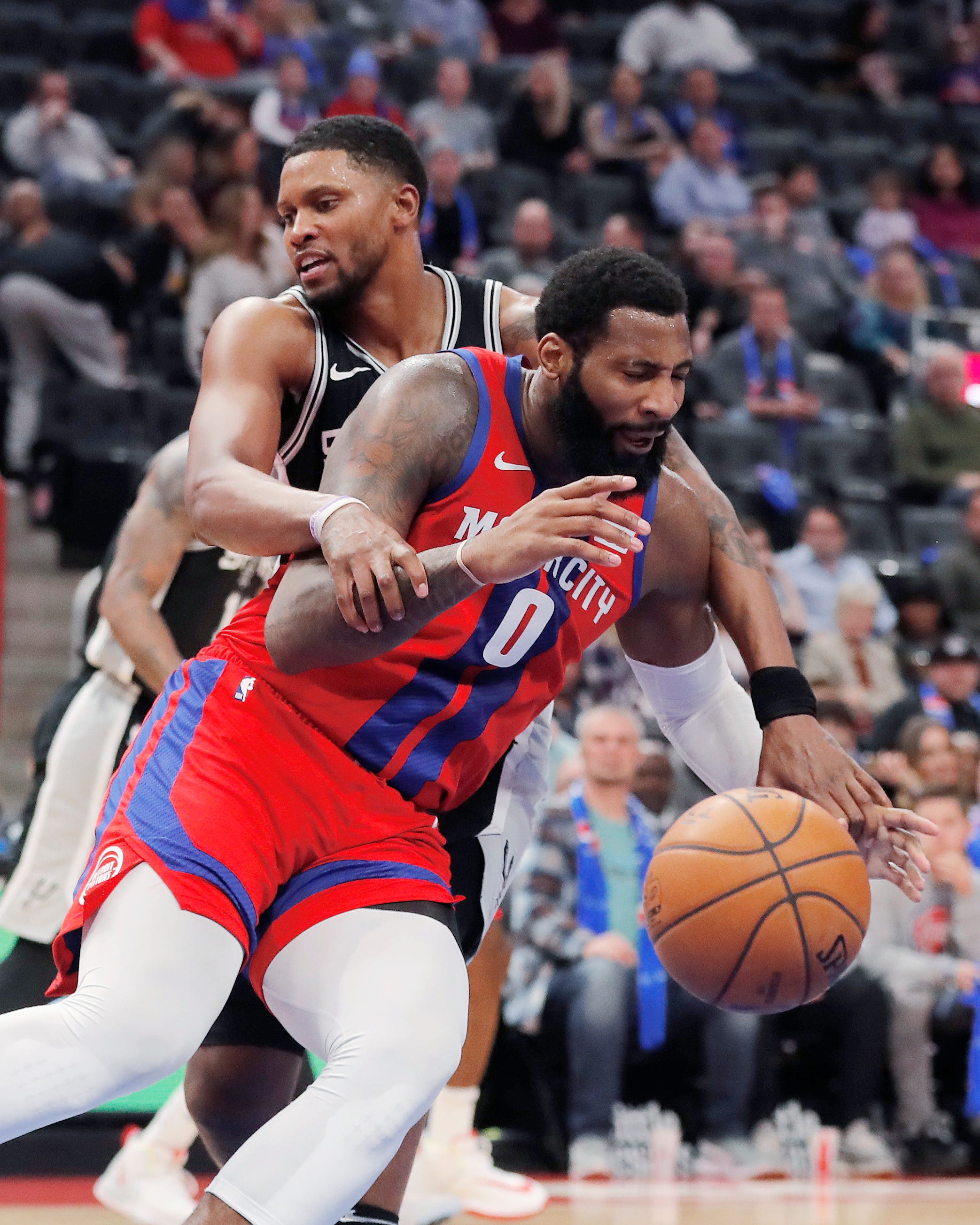 San Antonio Spurs forward Rudy Gay fouls Detroit Pistons center Andre Drummond (0) during the second half.