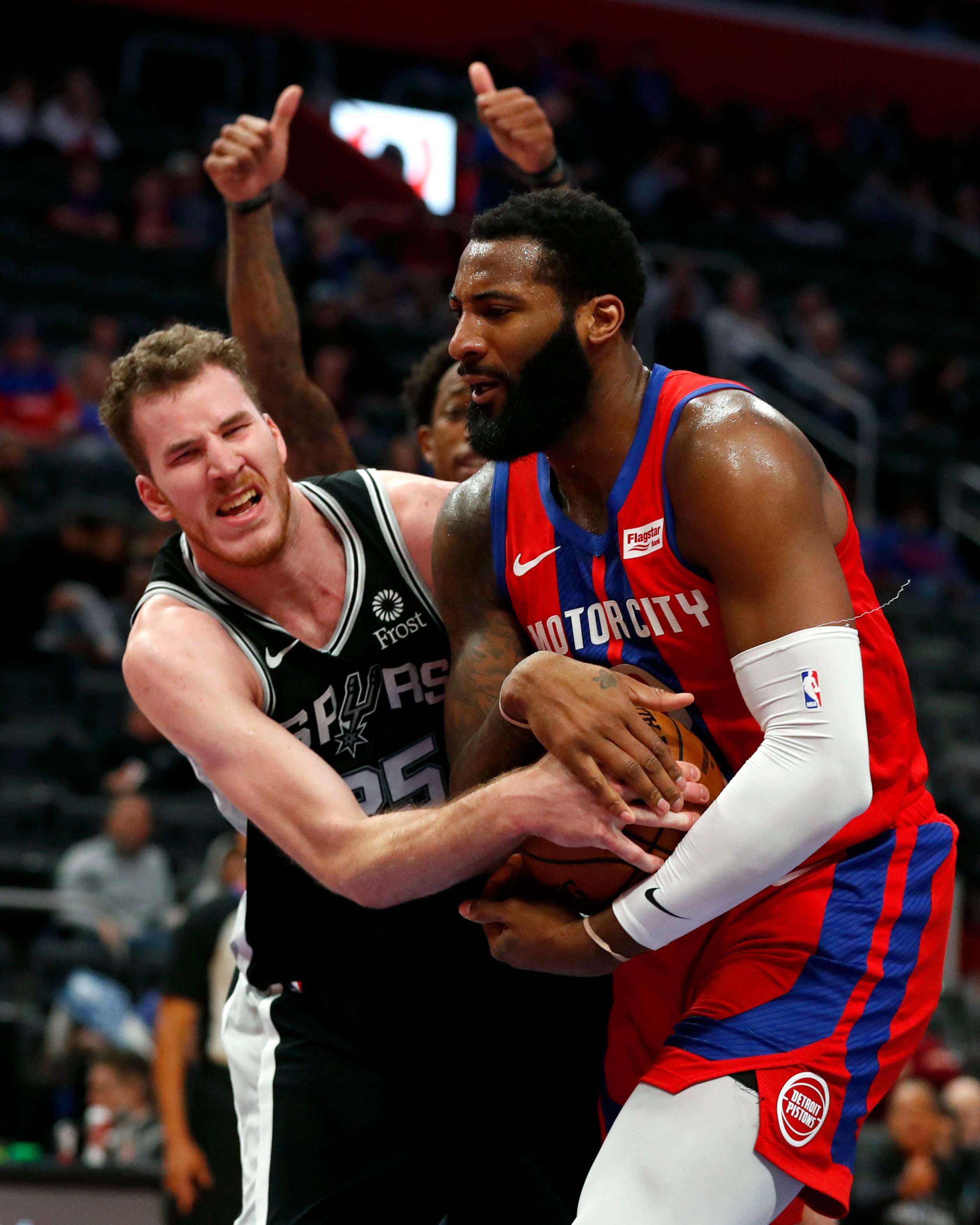 San Antonio Spurs center Jakob Poeltl (25) attempts to take the ball away from Detroit Pistons center Andre Drummond during the second half.