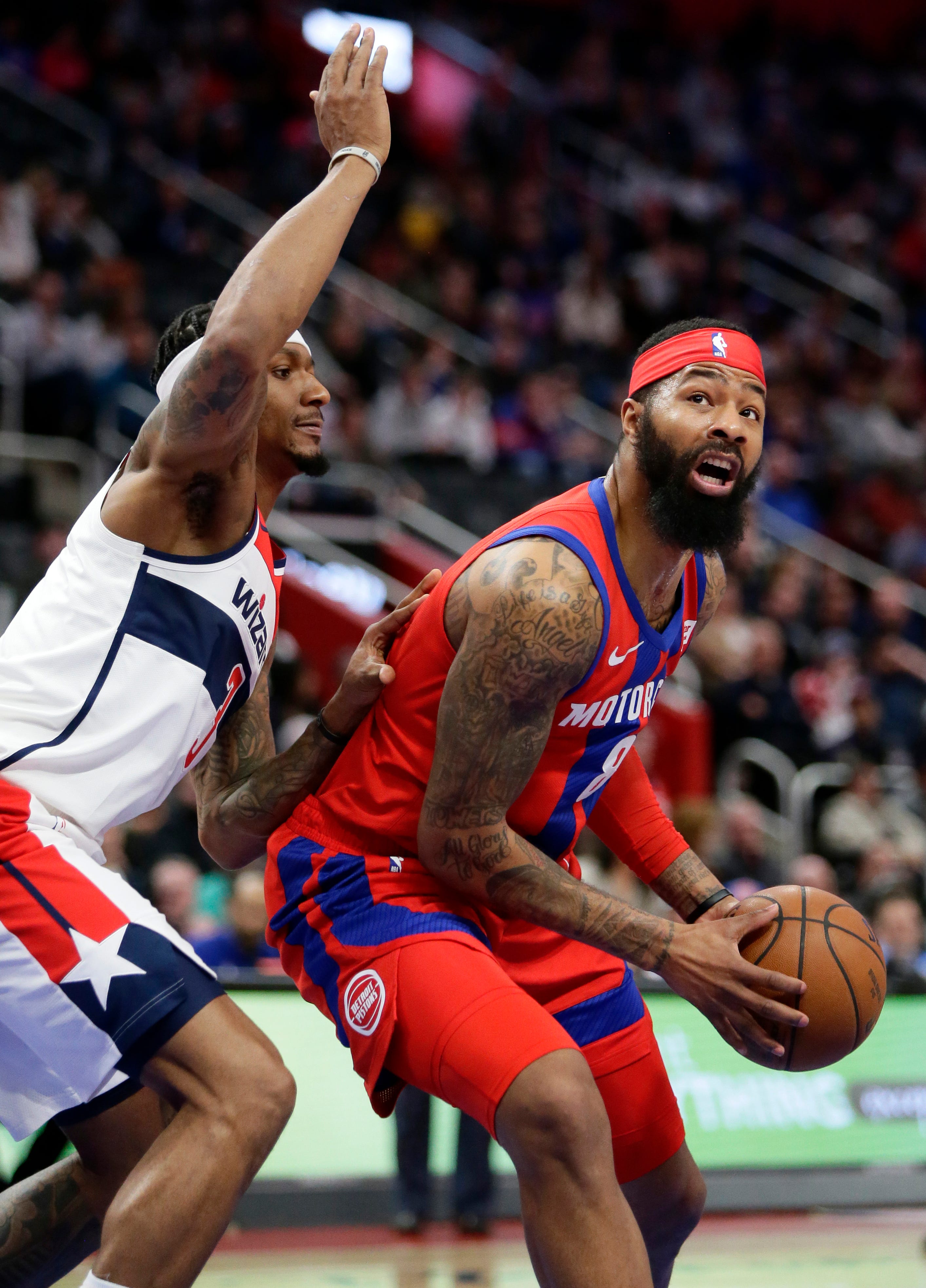 Detroit Pistons forward Markieff Morris (8) goes to the basket against Washington Wizards guard Bradley Beal (3) during the first half.