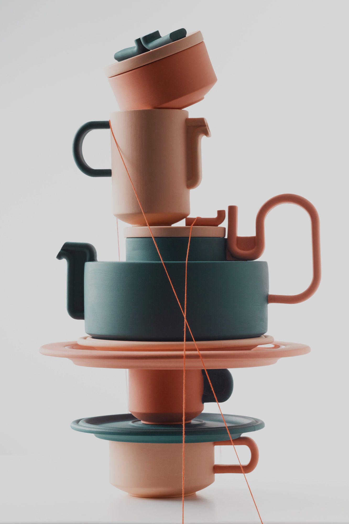 British designer Bethan Laura Wood nodded to details in Rosenthal's classic TAC tea set by Bauhaus architect Walter Gropius, where the lid top and handle come together to create a single flowing curve, in her playful Tongue collection for Rosenthal. Wood's design also references other elements throughout the brand's history, from the wiggles of Eduardo Paolozzi, to the hot pink flamingos that once took up residence in the center of the factory.