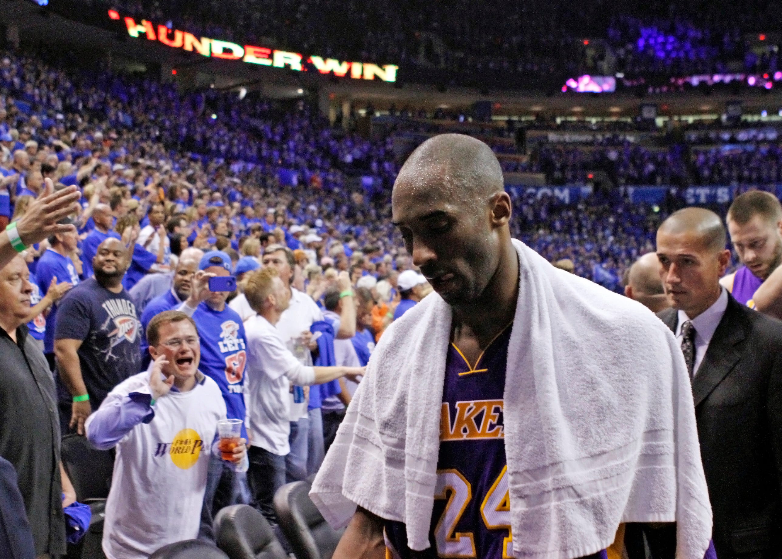Kobe Bryant walks off the court in May 2012.