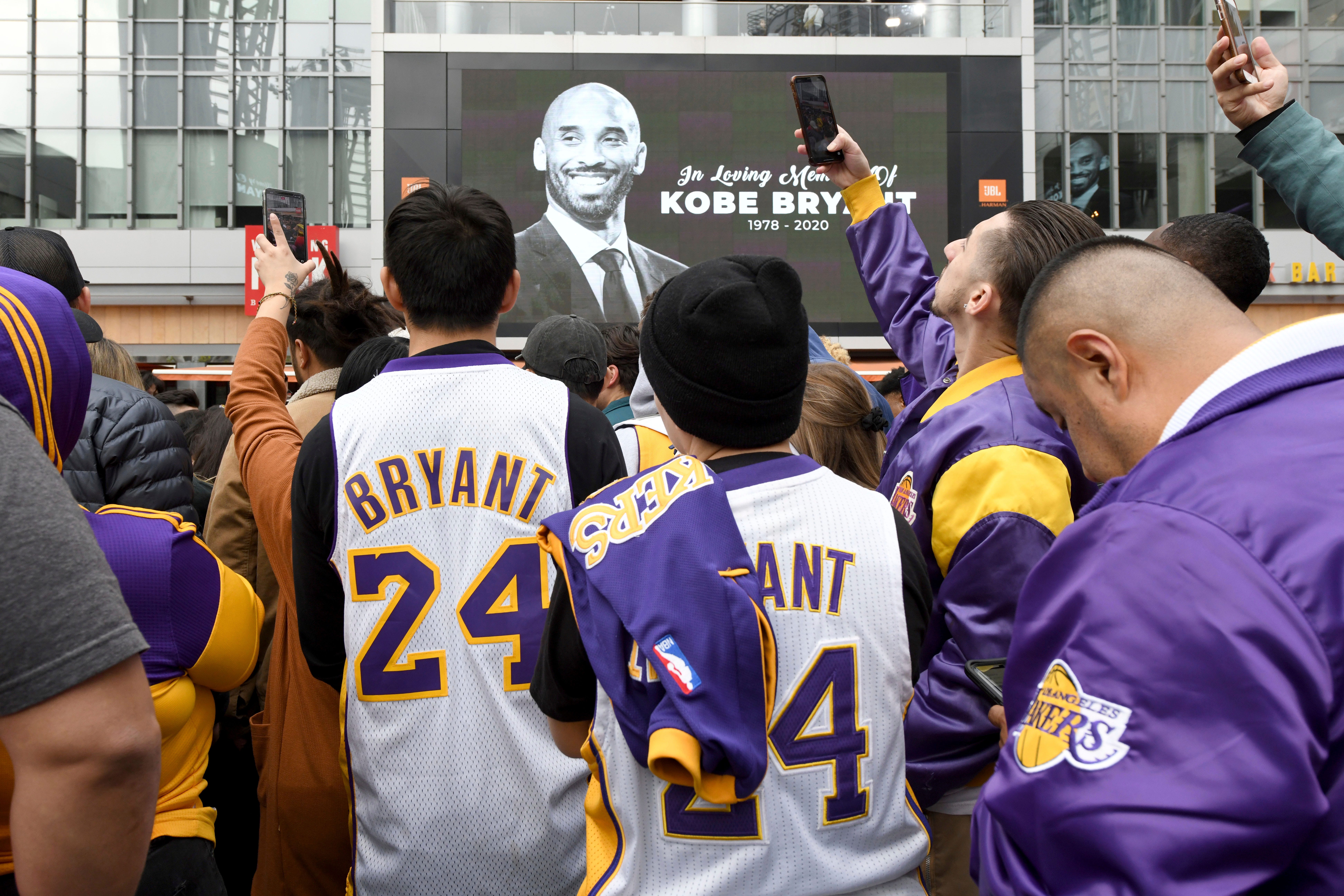 People gather outside Staples Center after the death of Laker legend Kobe Bryant.