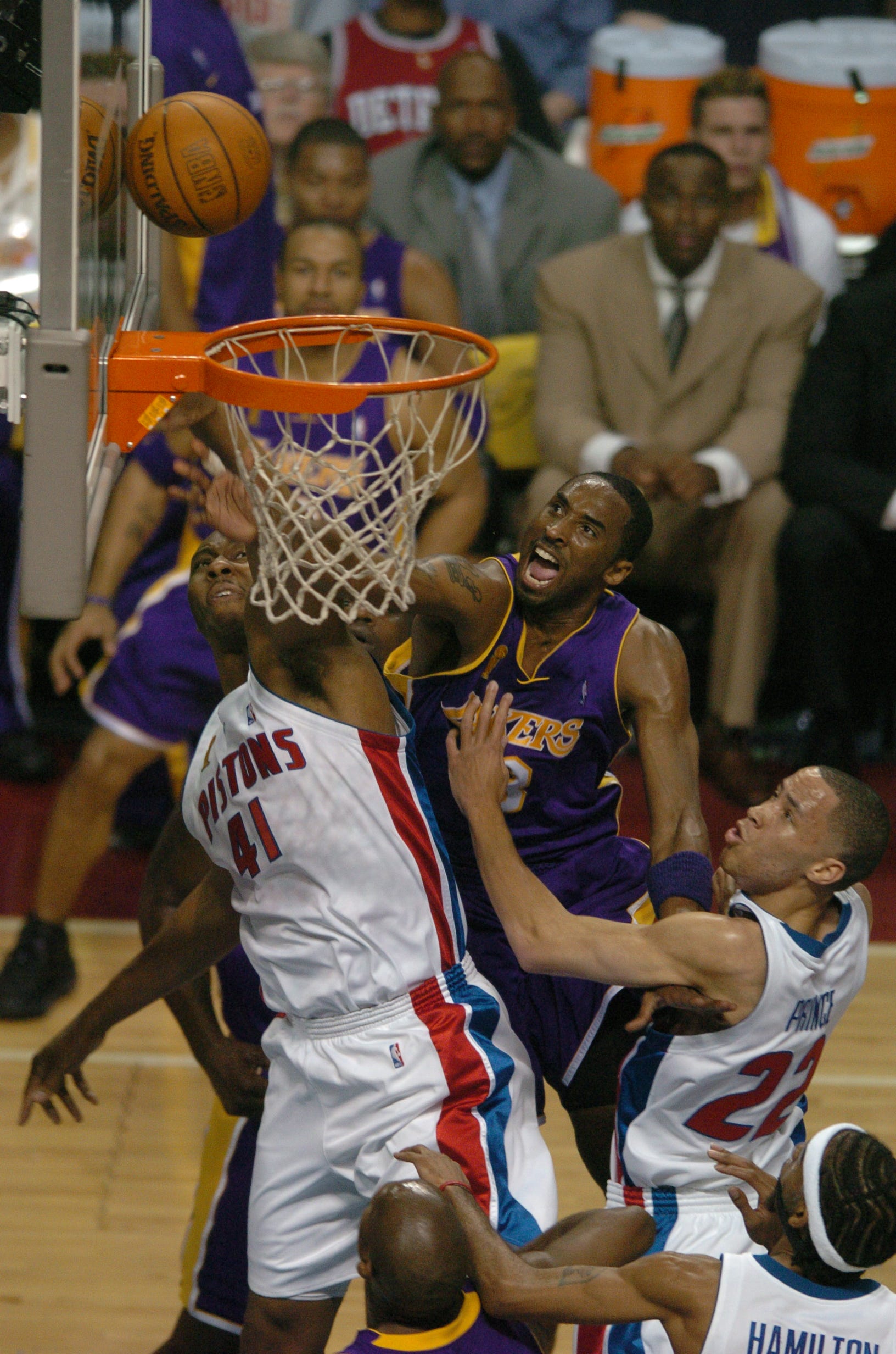Kobe Bryant and Elden Campbell mix it up under the basket as the Pistons host the Lakers in Game 5 of the NBA Finals in 2004.