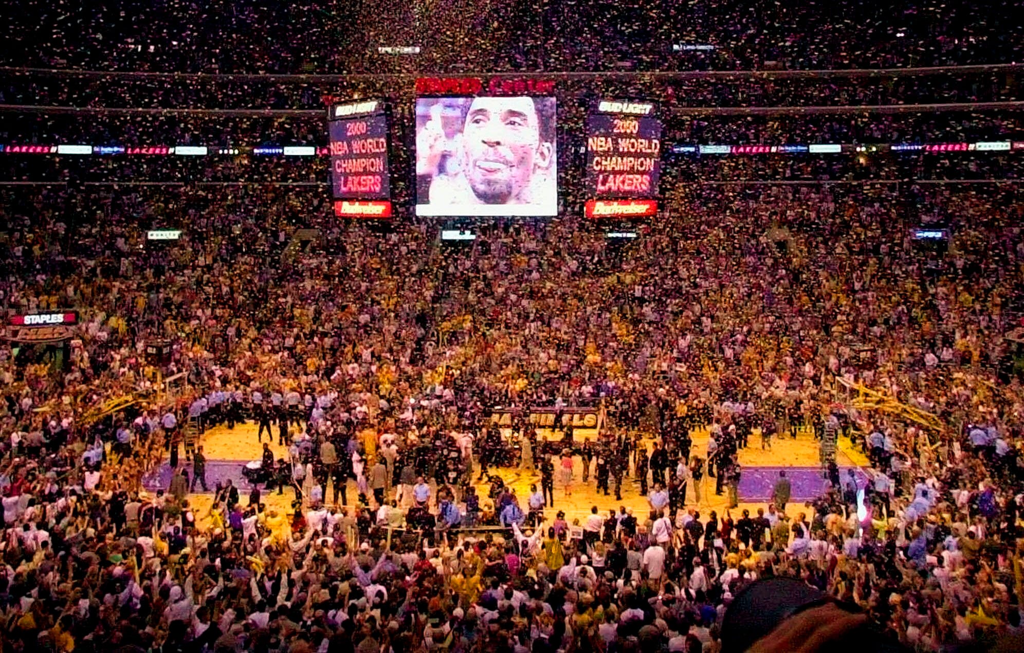In this June 19, 2000, photo, Kobe Bryant and the Lakers celebrate their NBA championship.