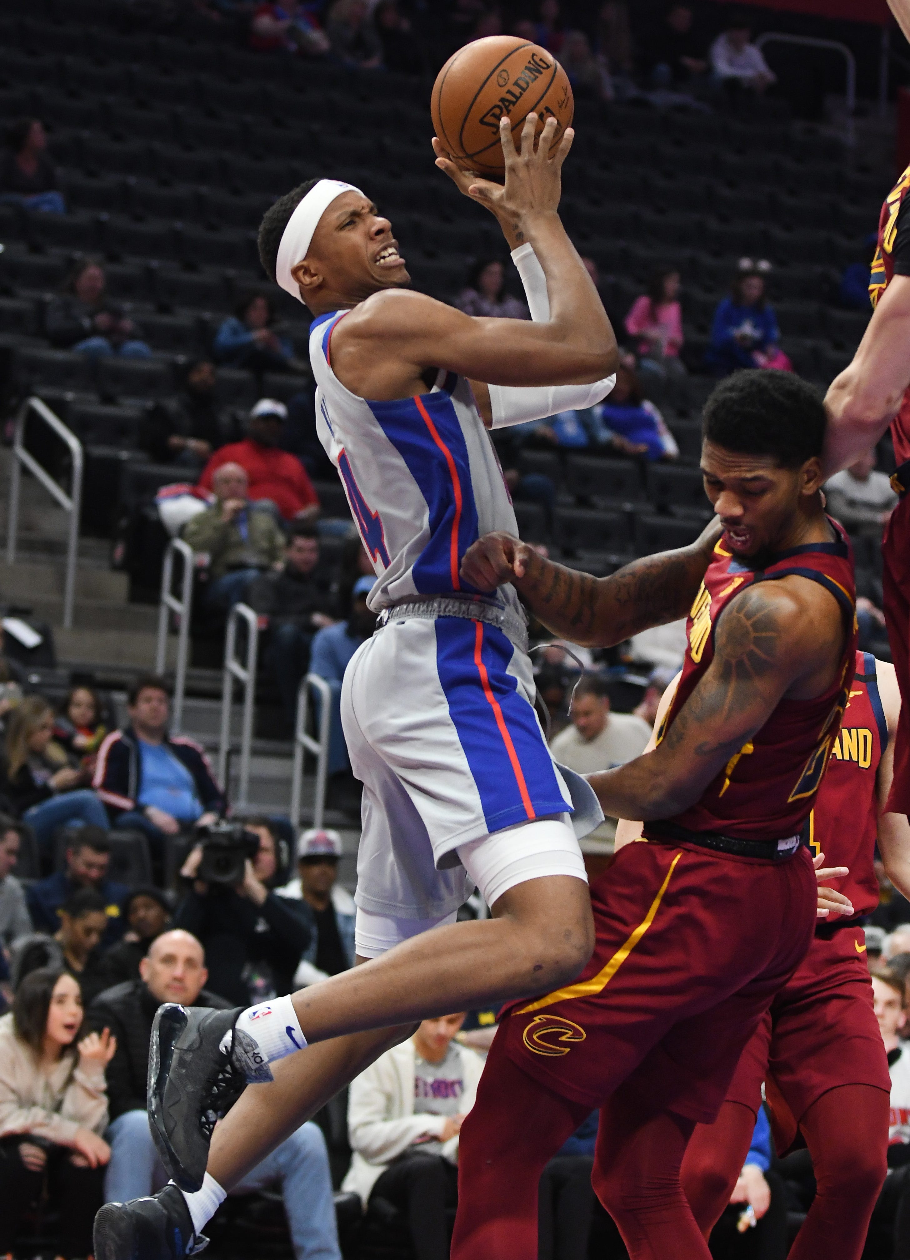 Pistons' Louis King attacks the basket with Cavaliers' Alfonzo McKinnie defending in the second quarter.