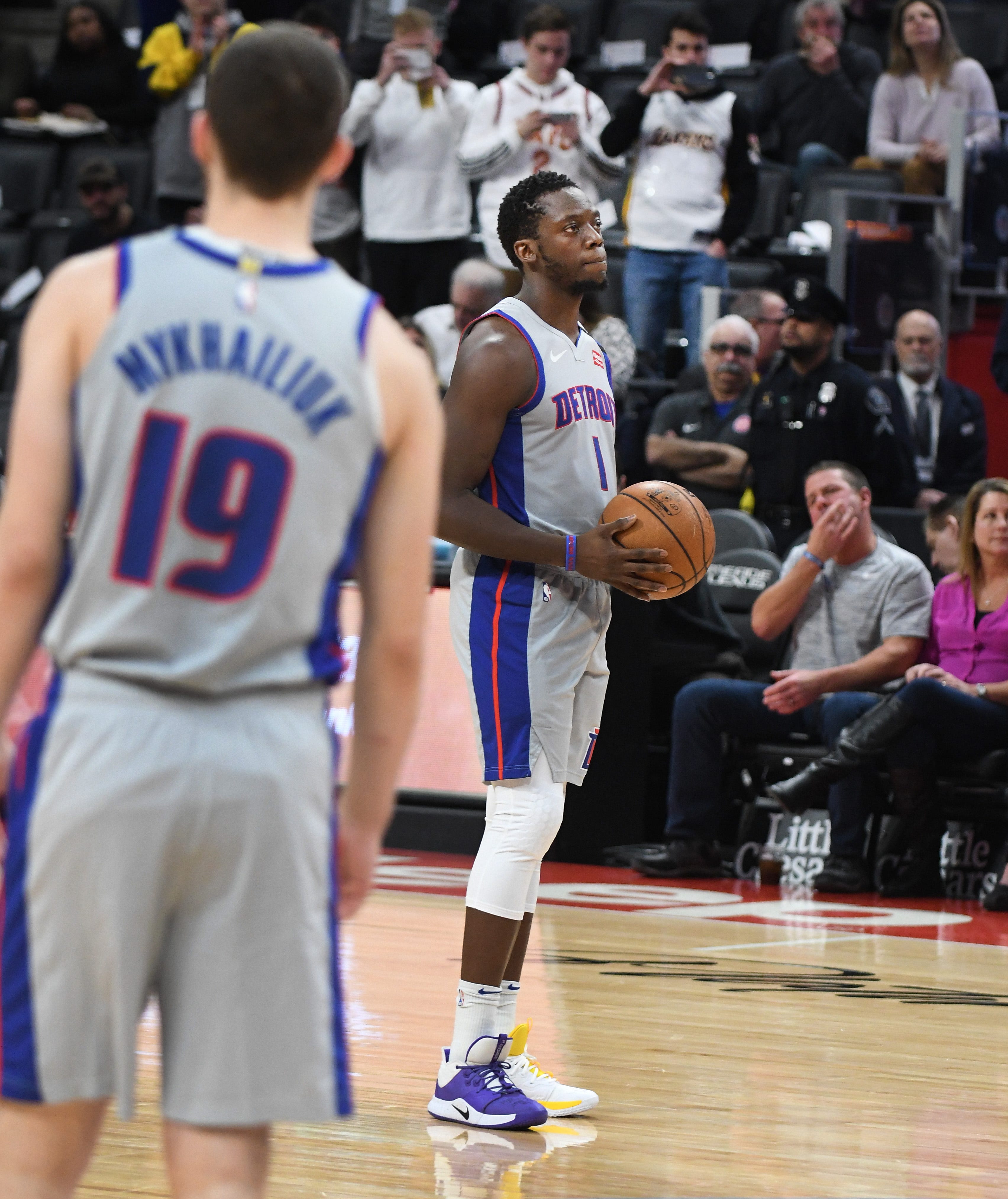 Pistons' Reggie Jackson holds onto the ball for an 8-second backcourt violation in memory of Kobe Bryant when he wore the No. 8 jersey at the start of the game against the Cleveland Cavaliers.