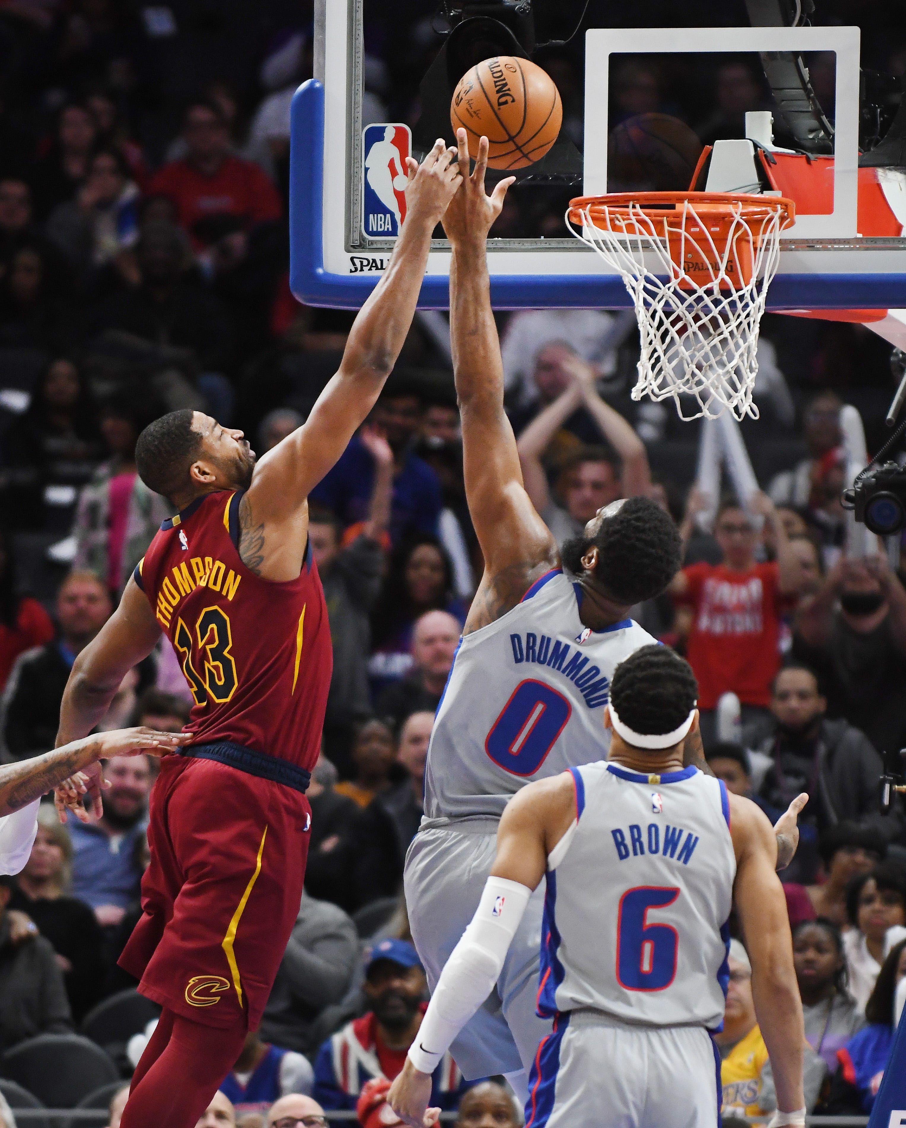 Cavaliers' Tristan Thompson puts up a shot and a bucket over Pistons' Andre Drummond in the second quarter.