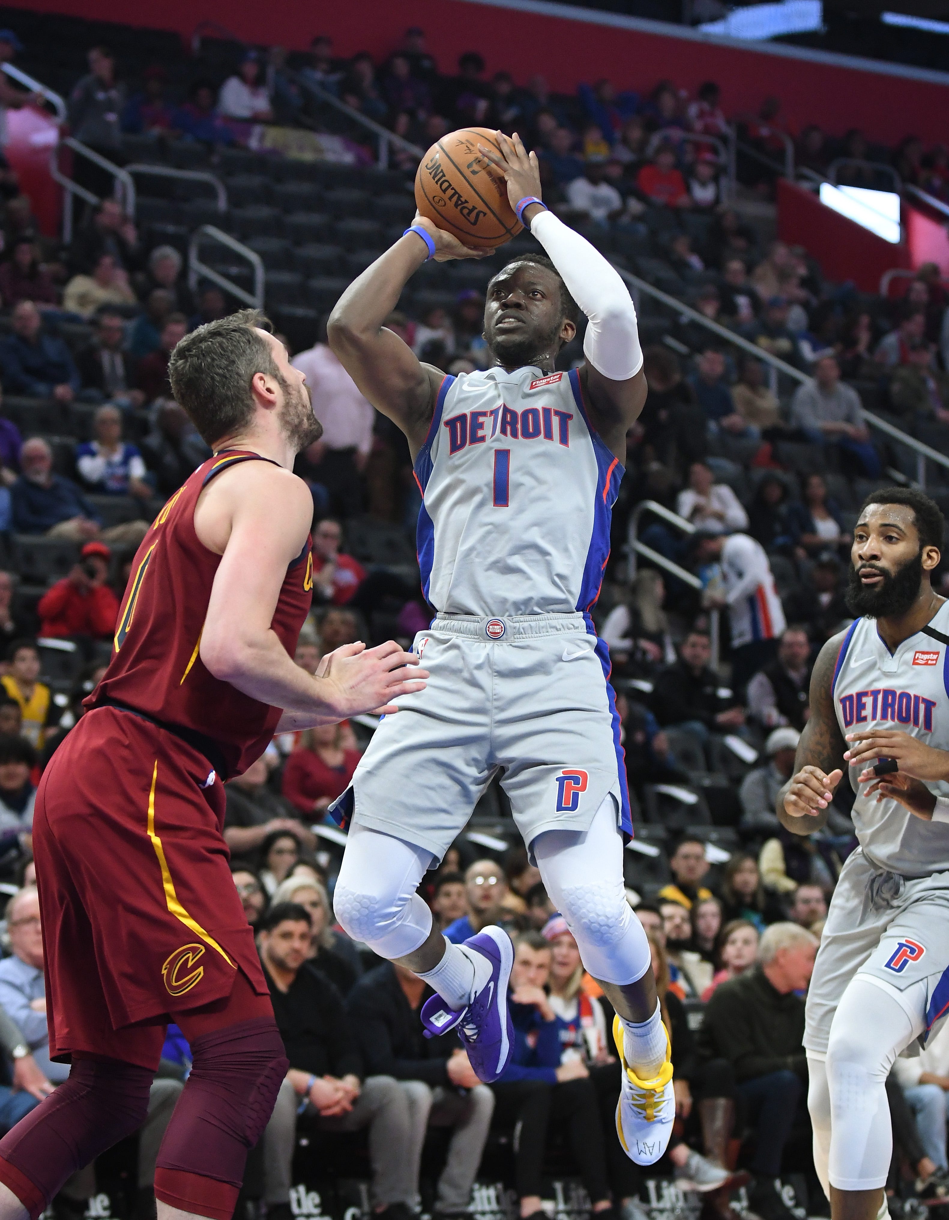 Pistons' Reggie Jackson attacks the basket, putting up a shot in the second quarter.