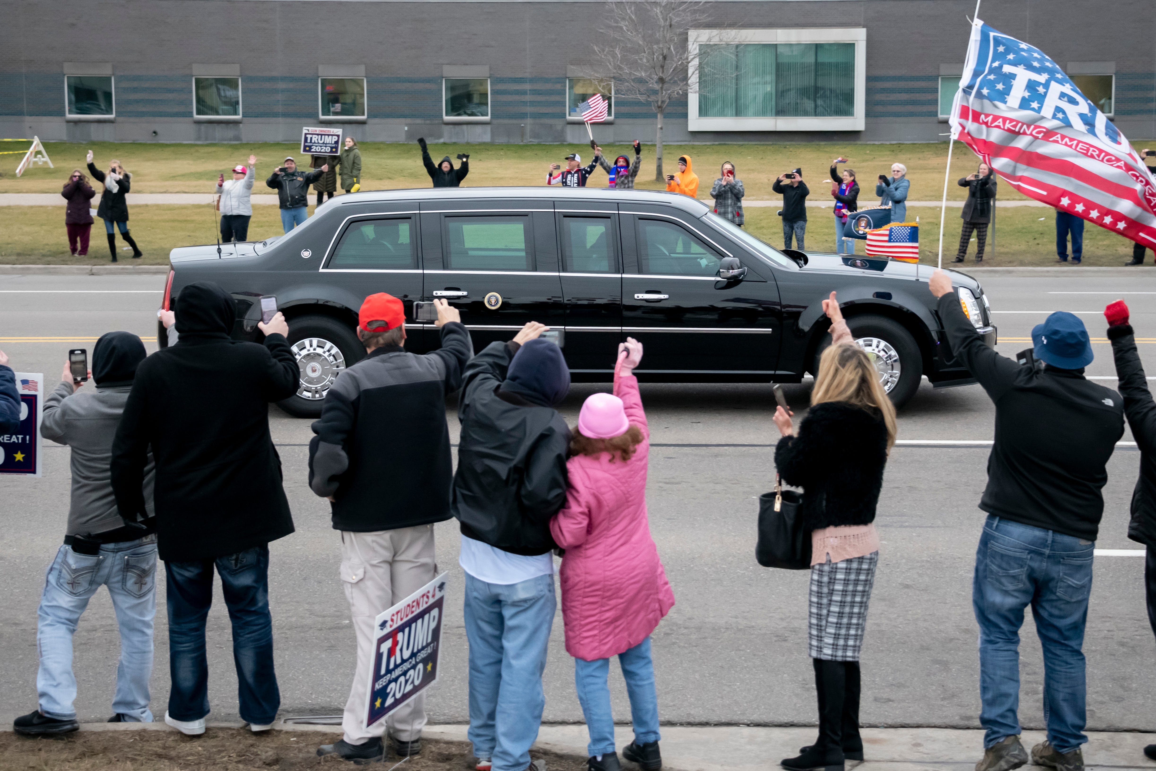 President Donald Trump's motorcade passes supporters along Van Dyke in Warren on Jan. 30, 2020.