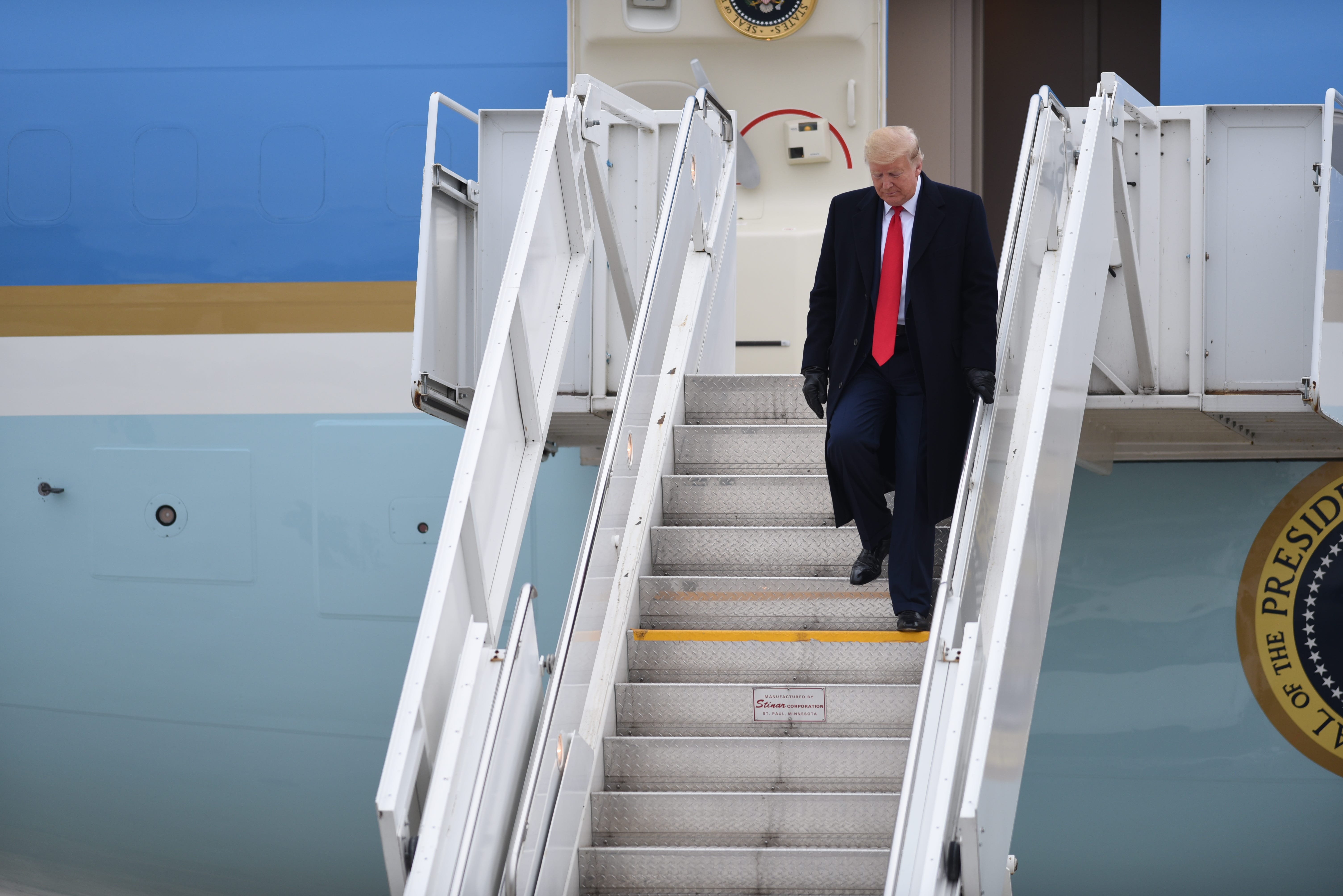 President Donald Trump arrives at Selfridge Air Base in Harrison Township, ahead of an appearance at Dana Inc., an auto supplier in Warren, on Jan. 30, 2020.