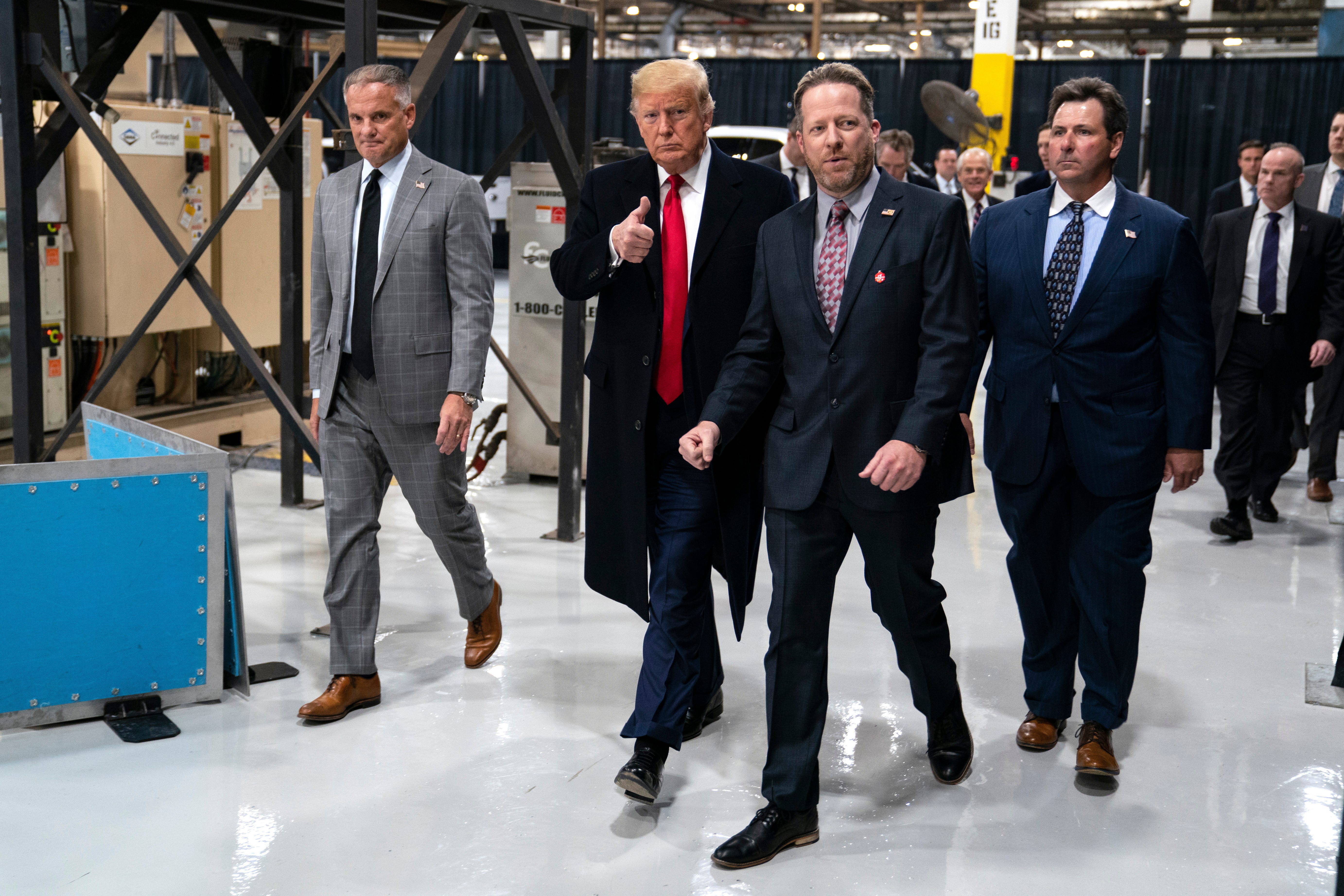 President Donald Trump tours Dana Incorporated before speaking about the new North American trade agreement, Thursday, Jan. 30, 2020, in Warren, Mich.
