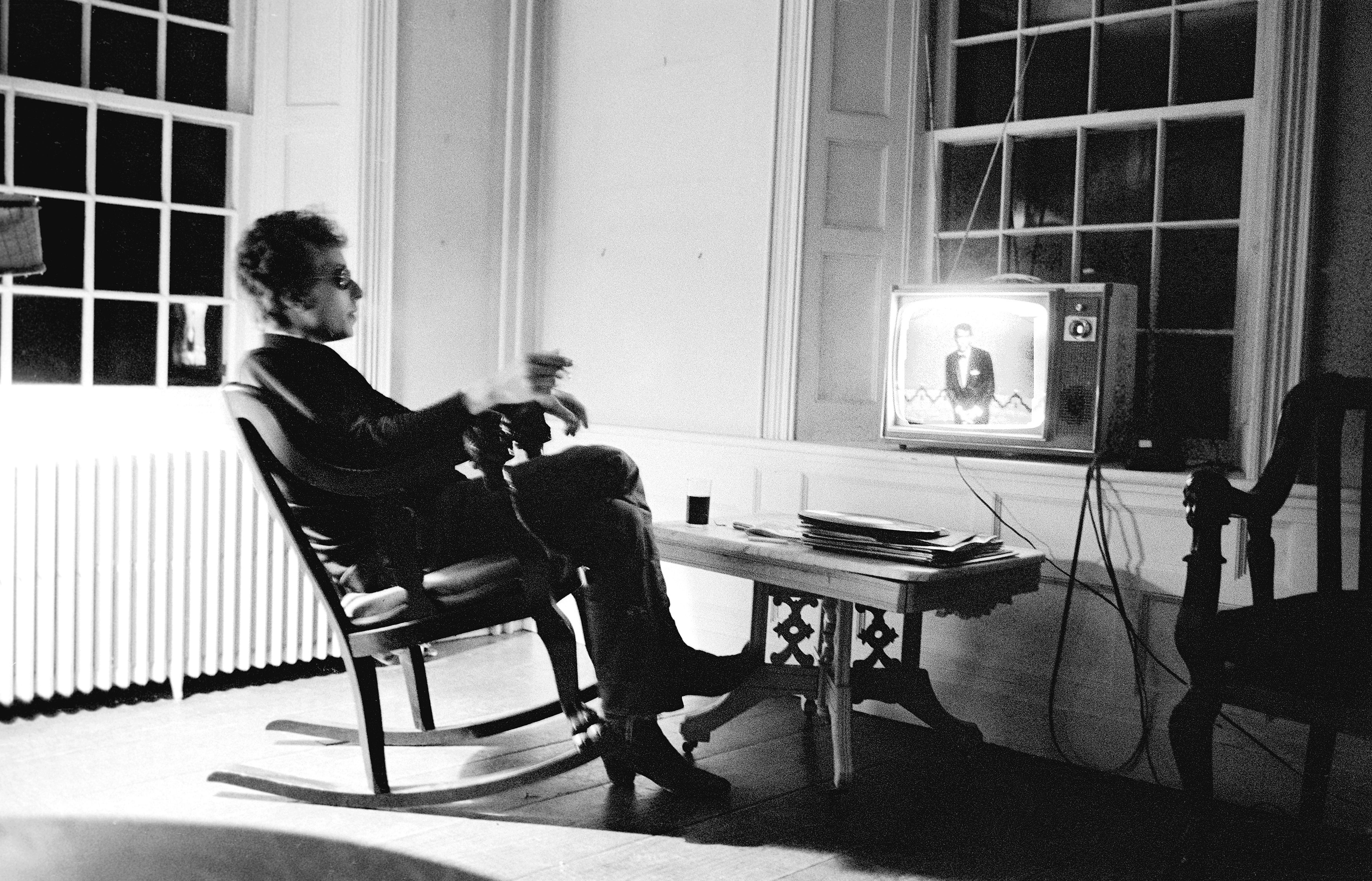 Bob Dylan watches Dean Martin at night, at home in Woodstock, NY, in 1964.