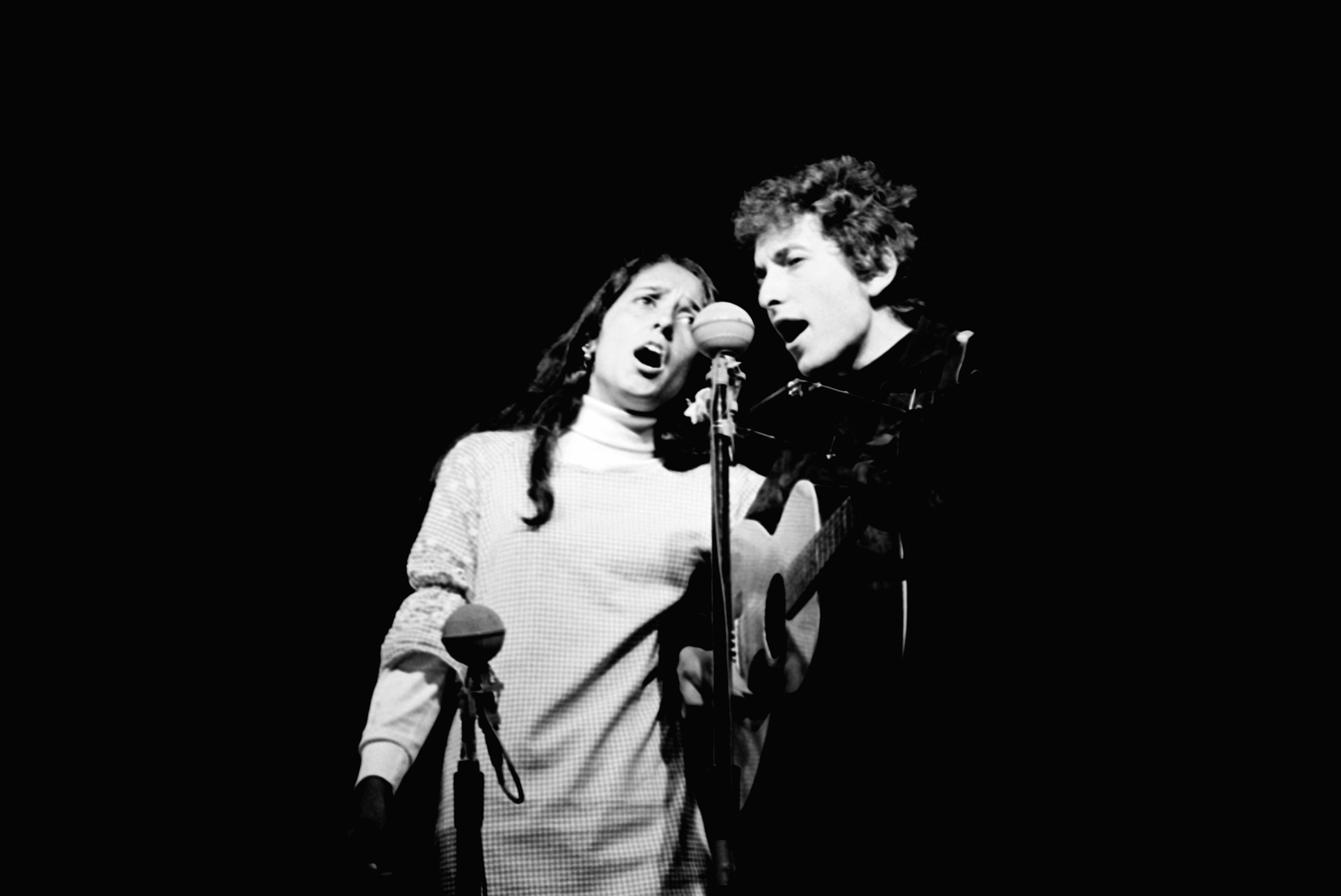 Bob Dylan and Joan Baez perform at night for Newport Folk Festival, Newport, Rhode Island, 1964