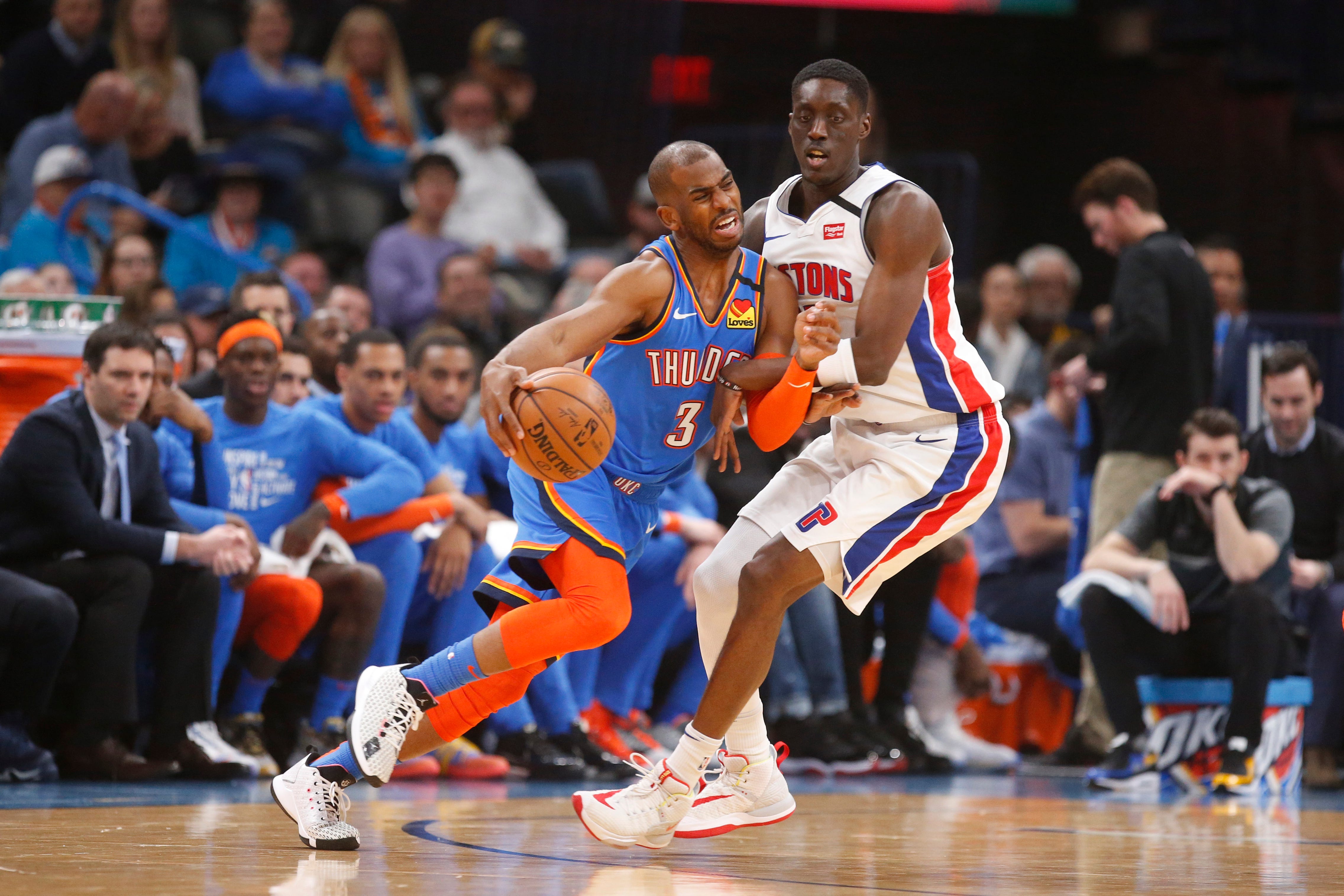 Oklahoma City Thunder guard Chris Paul (3) drives around Detroit Pistons forward Tony Snell during the first half of an NBA basketball game.