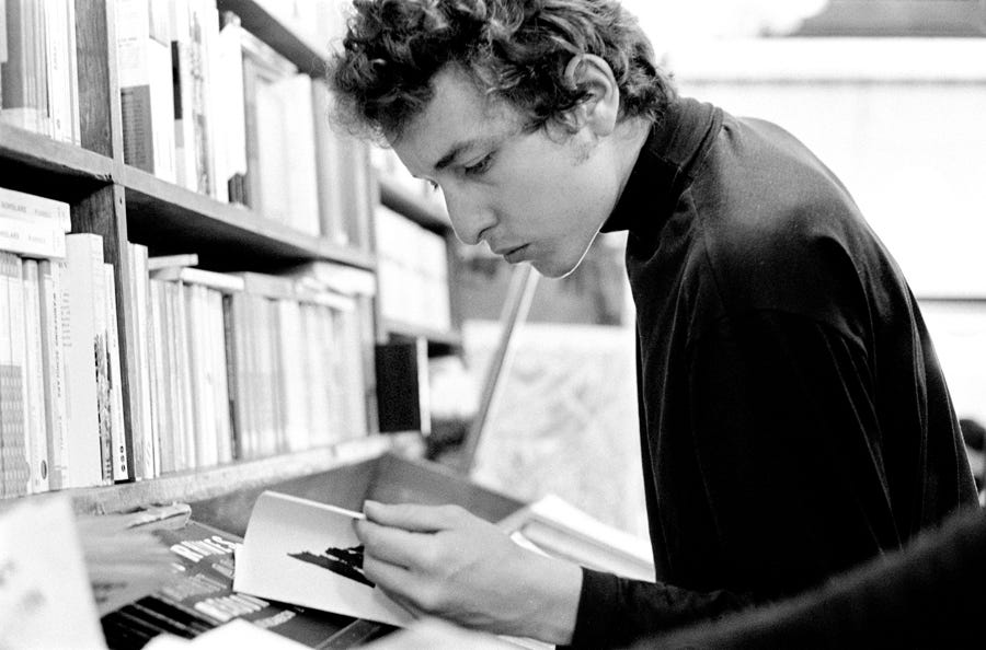 Bob Dylan browsing in Greenwich Village bookstore, NY, 1964