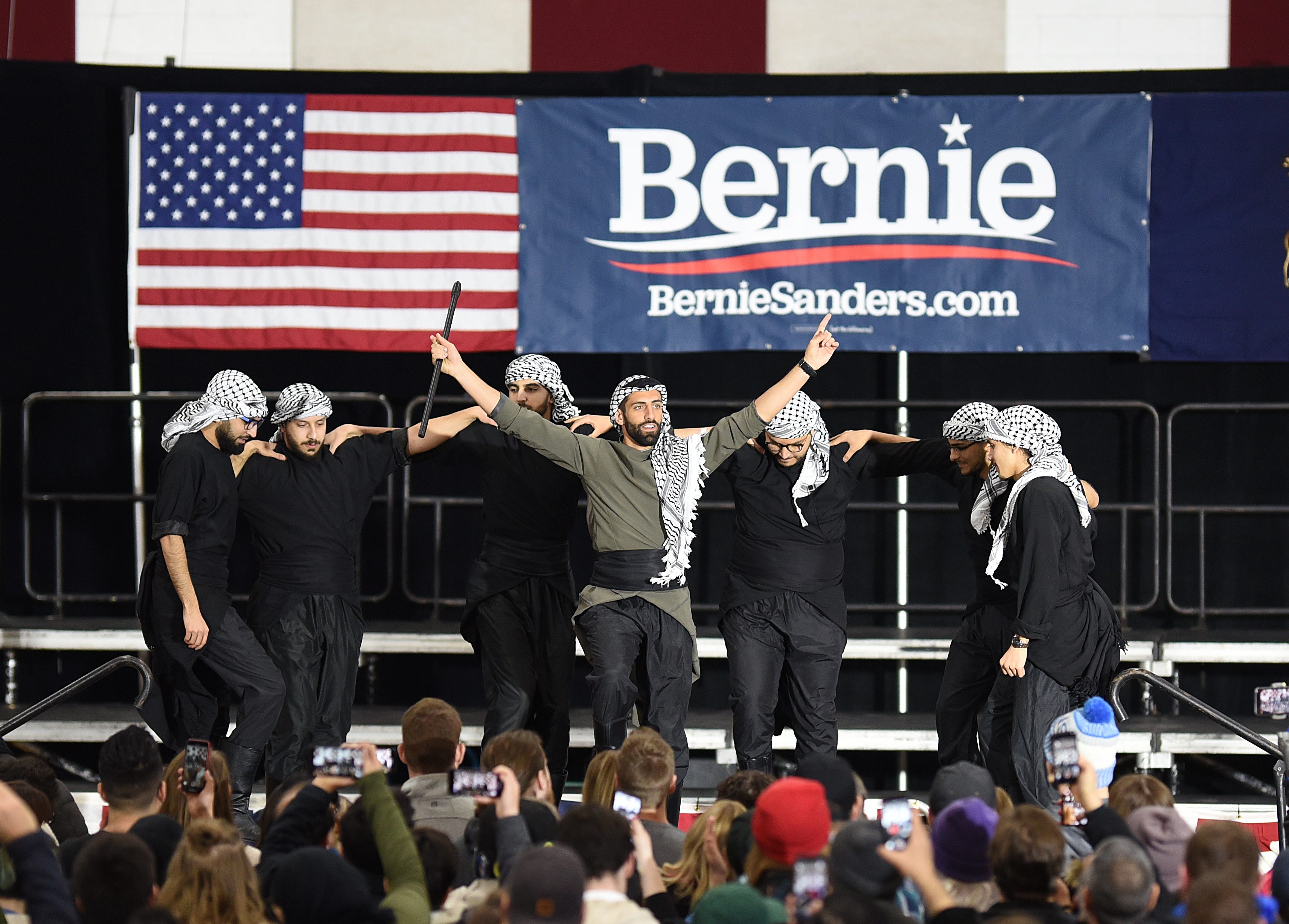 Members of the Mawtini Dabkeh Troupe of Dearborn perform before presidential candidate Bernie Sanders spoke on stage during a campaign stop.