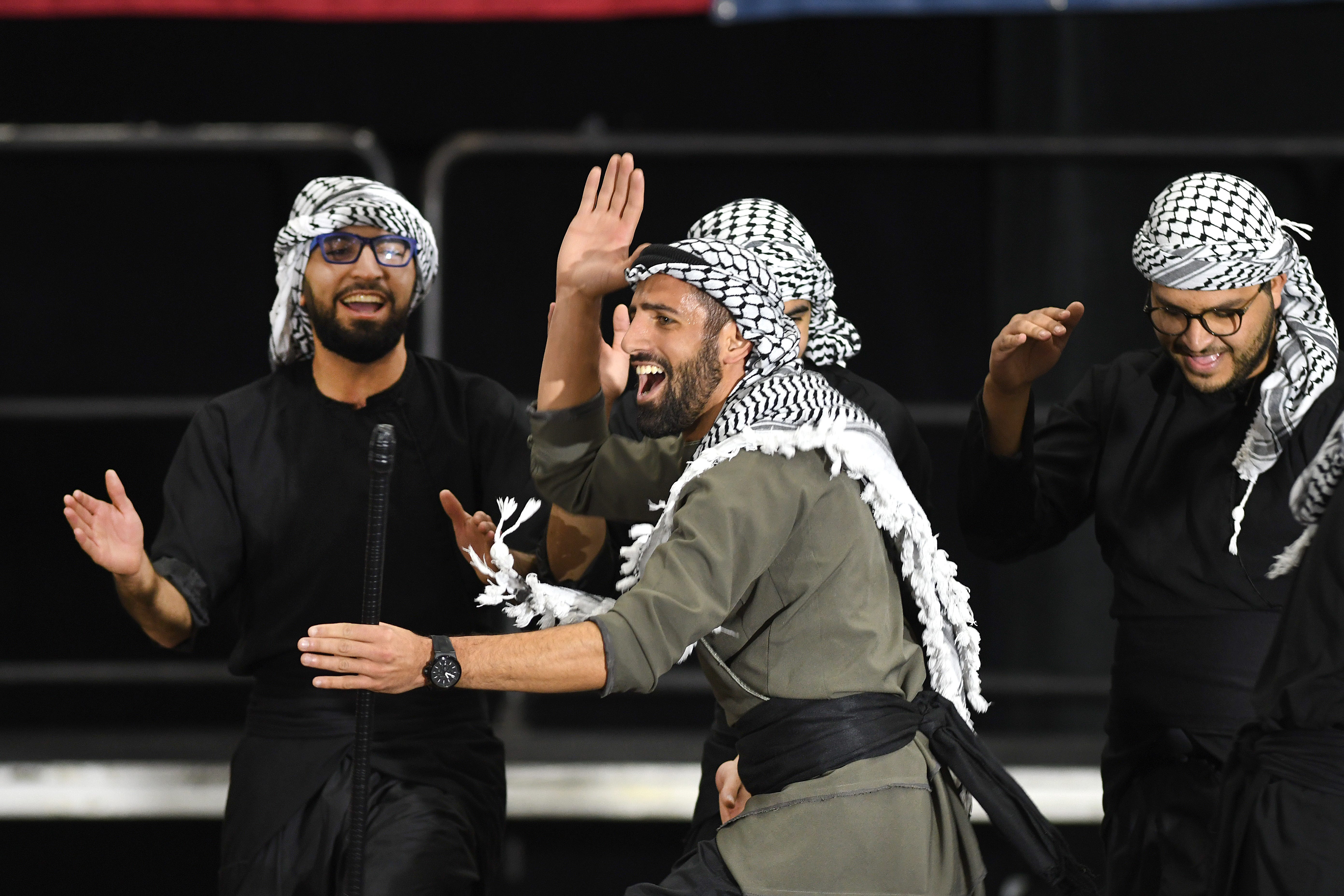Members of the Mawtini Dabkeh Troupe of Dearborn perform before presidential candidate Bernie Sanders spoke on stage during a campaign rally at Salina Intermediate School in Dearborn.