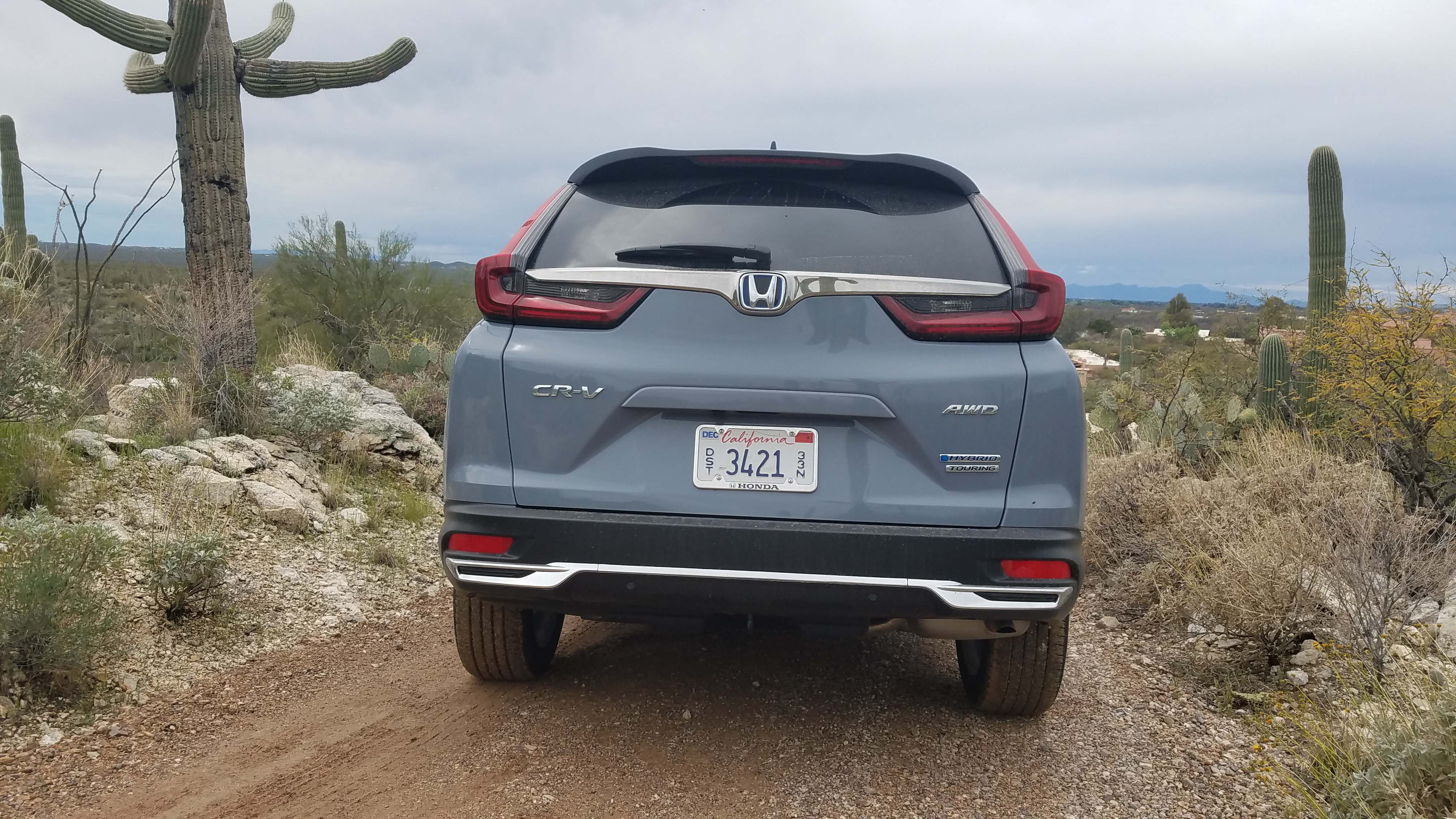 The 2020 Honda CR-V Hybrid comes standard in AWD. Its boomerang rear taillights are a CR-V signature.