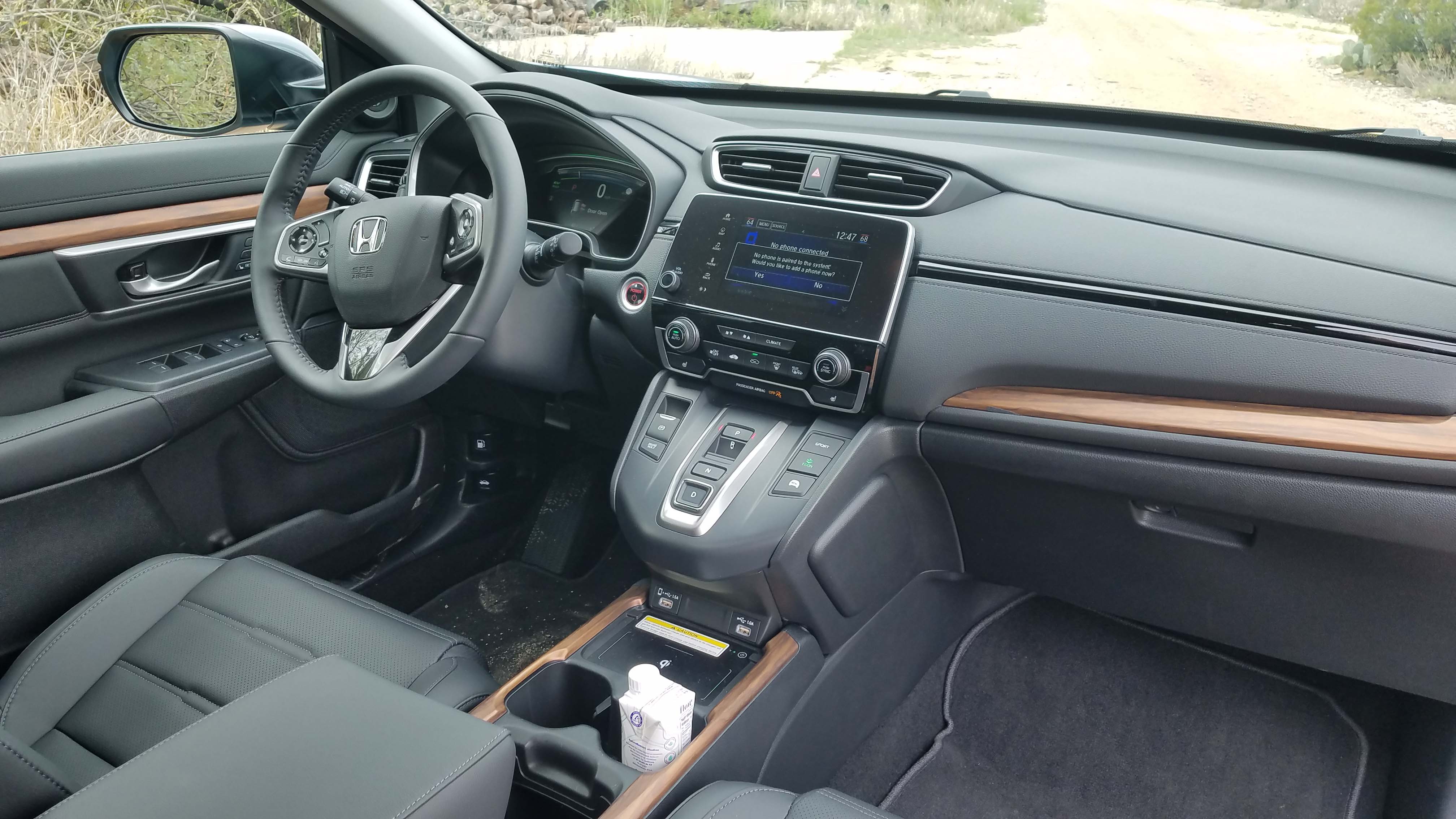 The interior of the 2020 Honda CR-V Hybrid is an easy place to get around with good storage, digital displays and smartphone connectivity.