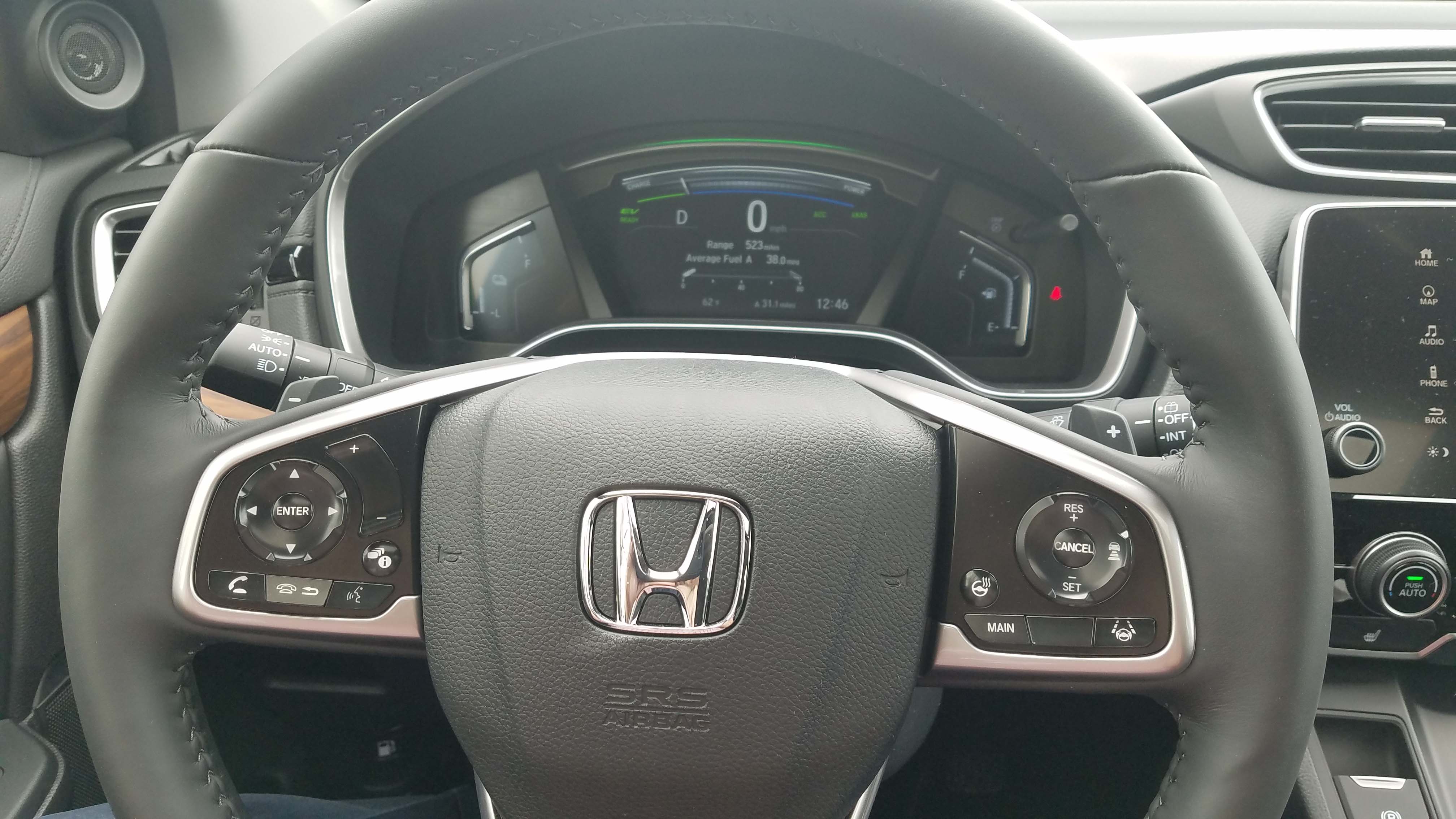 Standard goodies. The 2020 Honda CR-V Hybrid boasts a digital dash and standard adaptive cruise control controlled from the steering wheel.