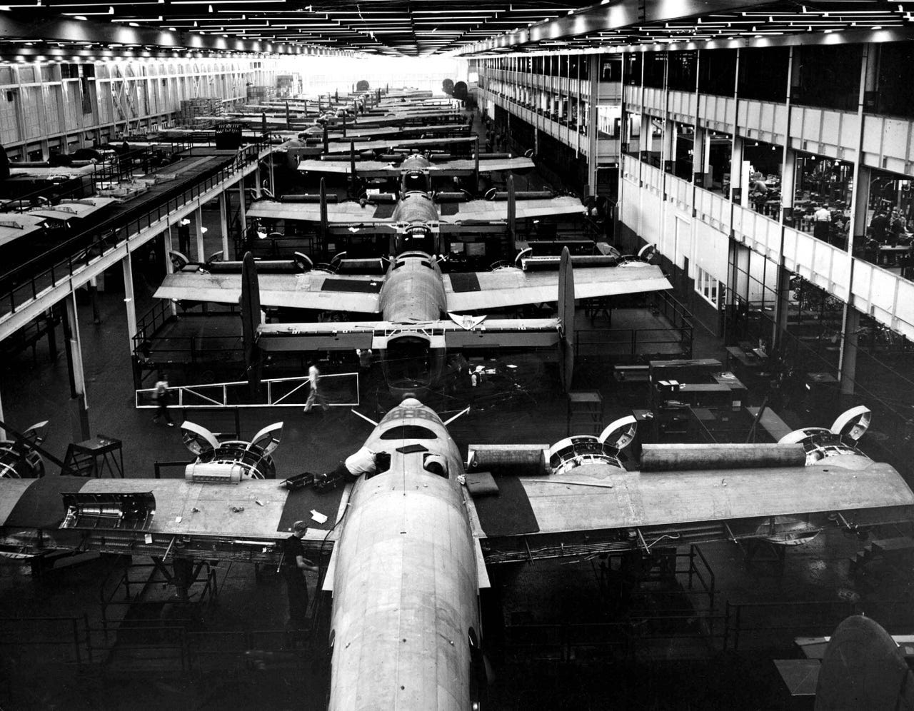 Interior fittings, plumbing and wiring were added to Liberator B24 bombers at a twin assembly line at the Ford Motor Company's Willow Run plant on Feb. 24, 1943. Detroit's role in the war, when the auto factories turned out tanks and warplanes, earned it a place in history as the Arsenal of Democracy.