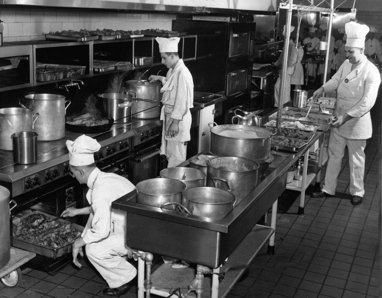 A full crew of cooks prepared meals for the cafeteria at the Ford Motor Company Willow Run Bomber plant on January 15, 1943.