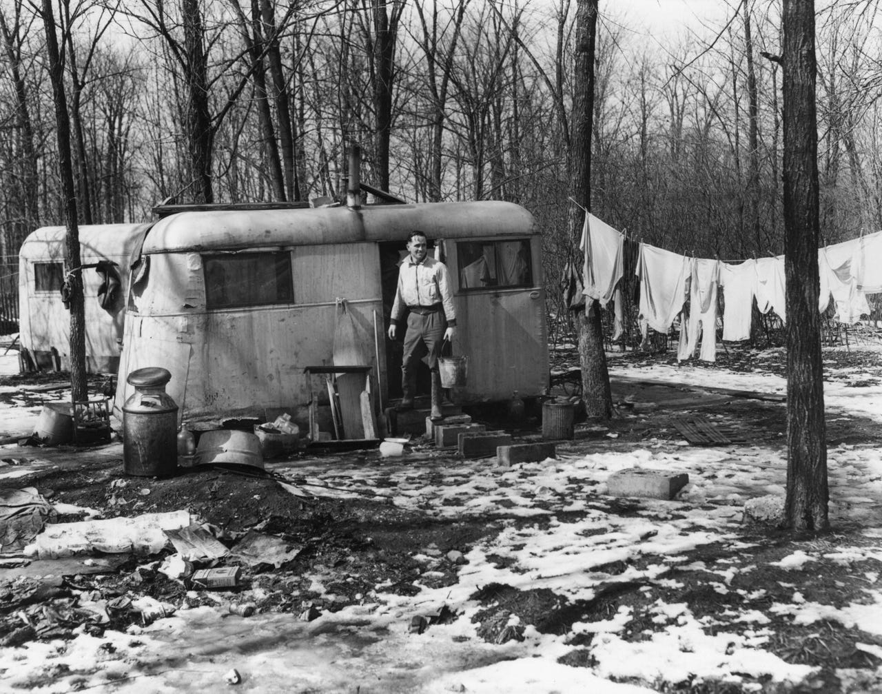 Ford Motor National Defense housing at the Willow Run Plant during the winter of 1943. Many employees were housed at Willow Run in huge government-built temporary dormitory-style housing for 14,000 workers. Others lived in tents, garages and trailers. There were angry calls for more permanent housing.