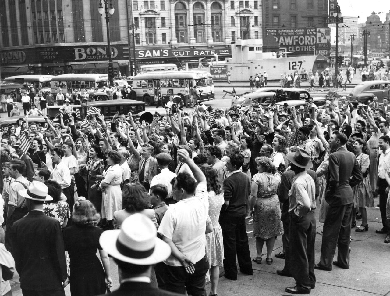 Crowds celebrate VJ Day in front of City Hall on Aug. 14, 1945.